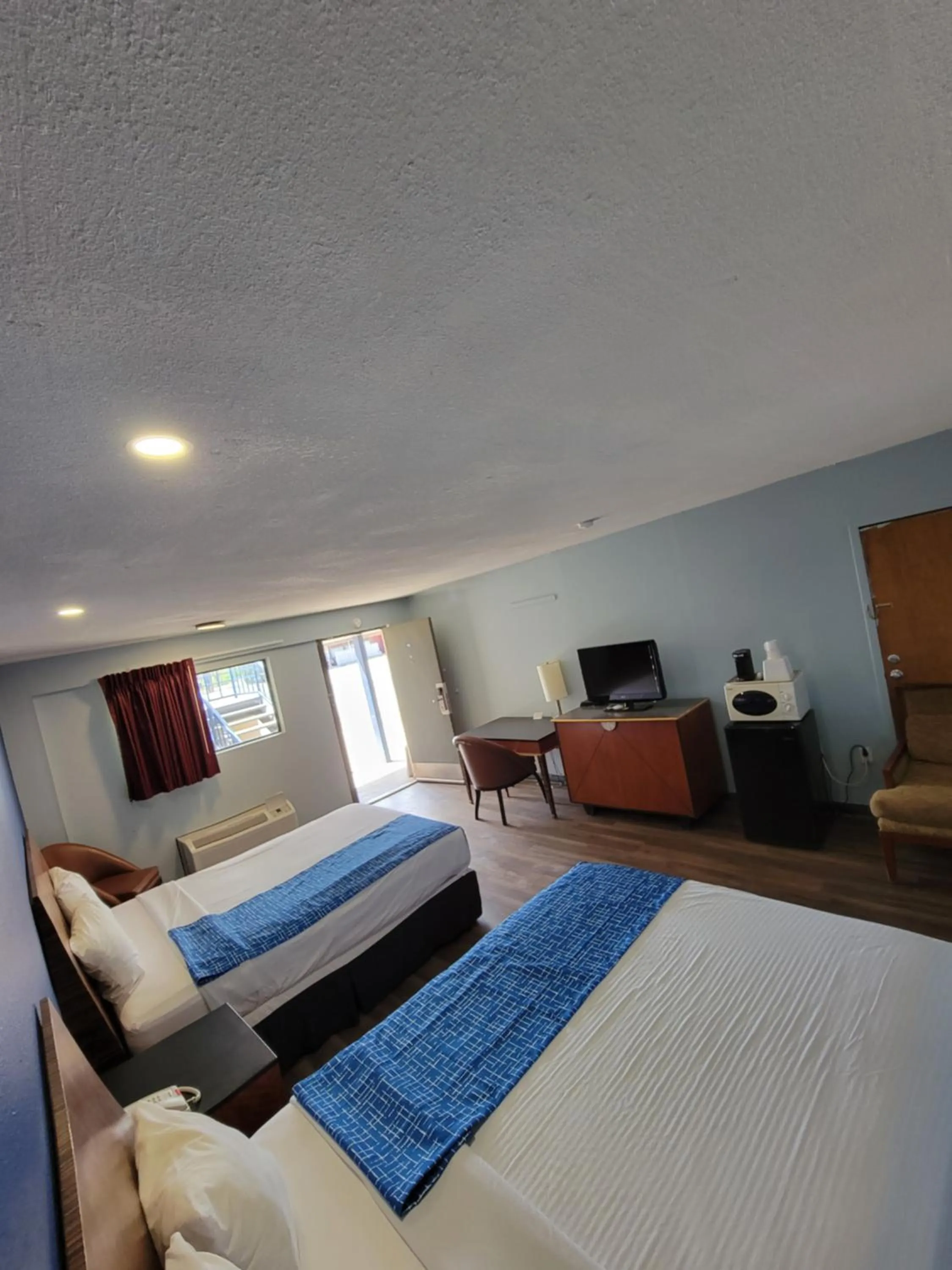 Photo of the whole room, Bed in Travelodge by Wyndham Clovis
