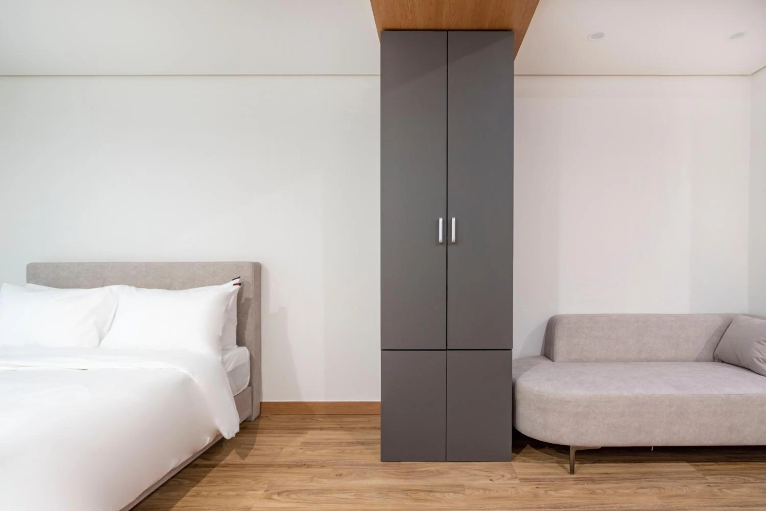 Seating area, Bed in Centum Convention Hotel In Centum