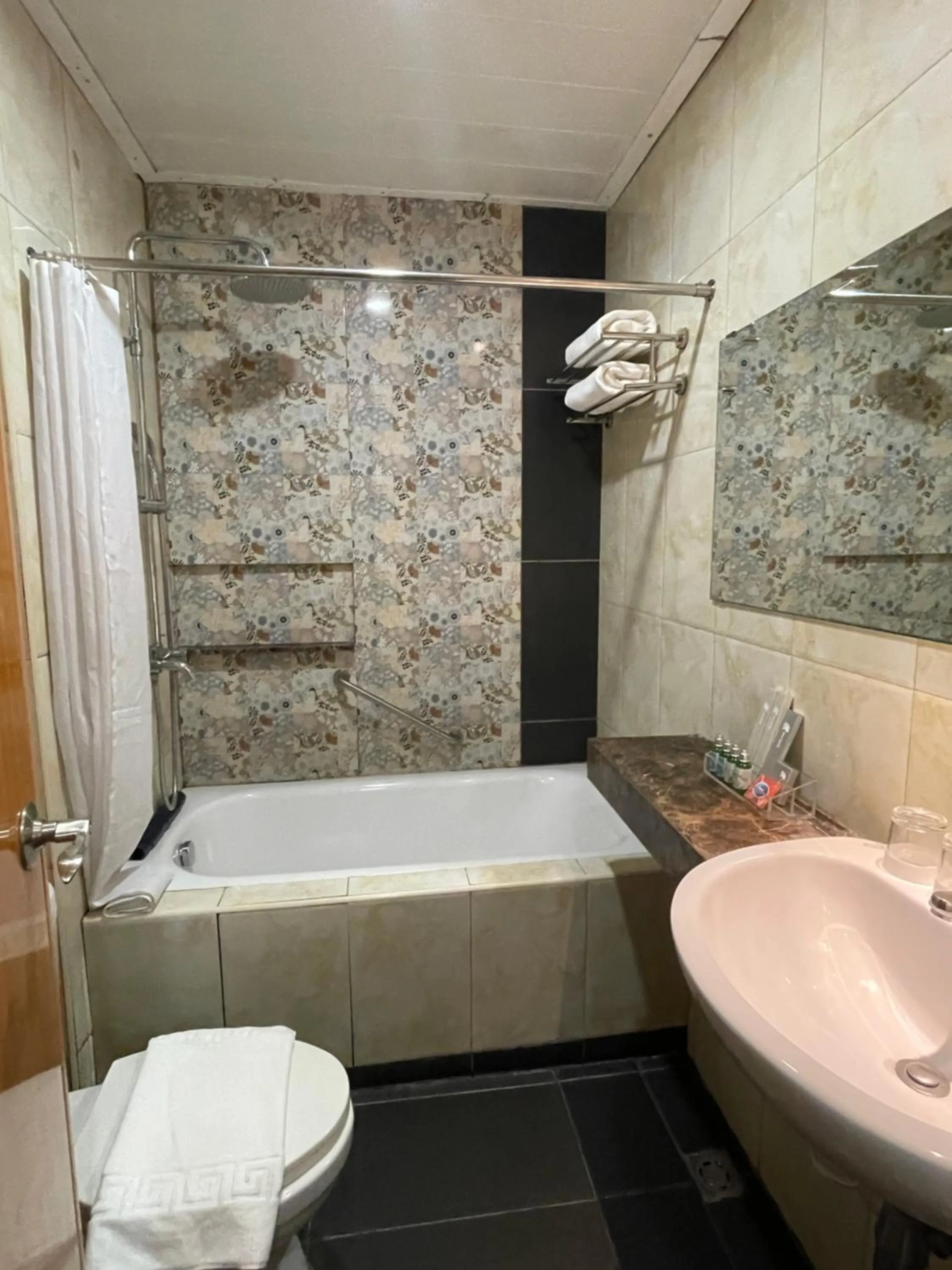 Shower in Homes at Bay Area Suites by SMS Hospitality