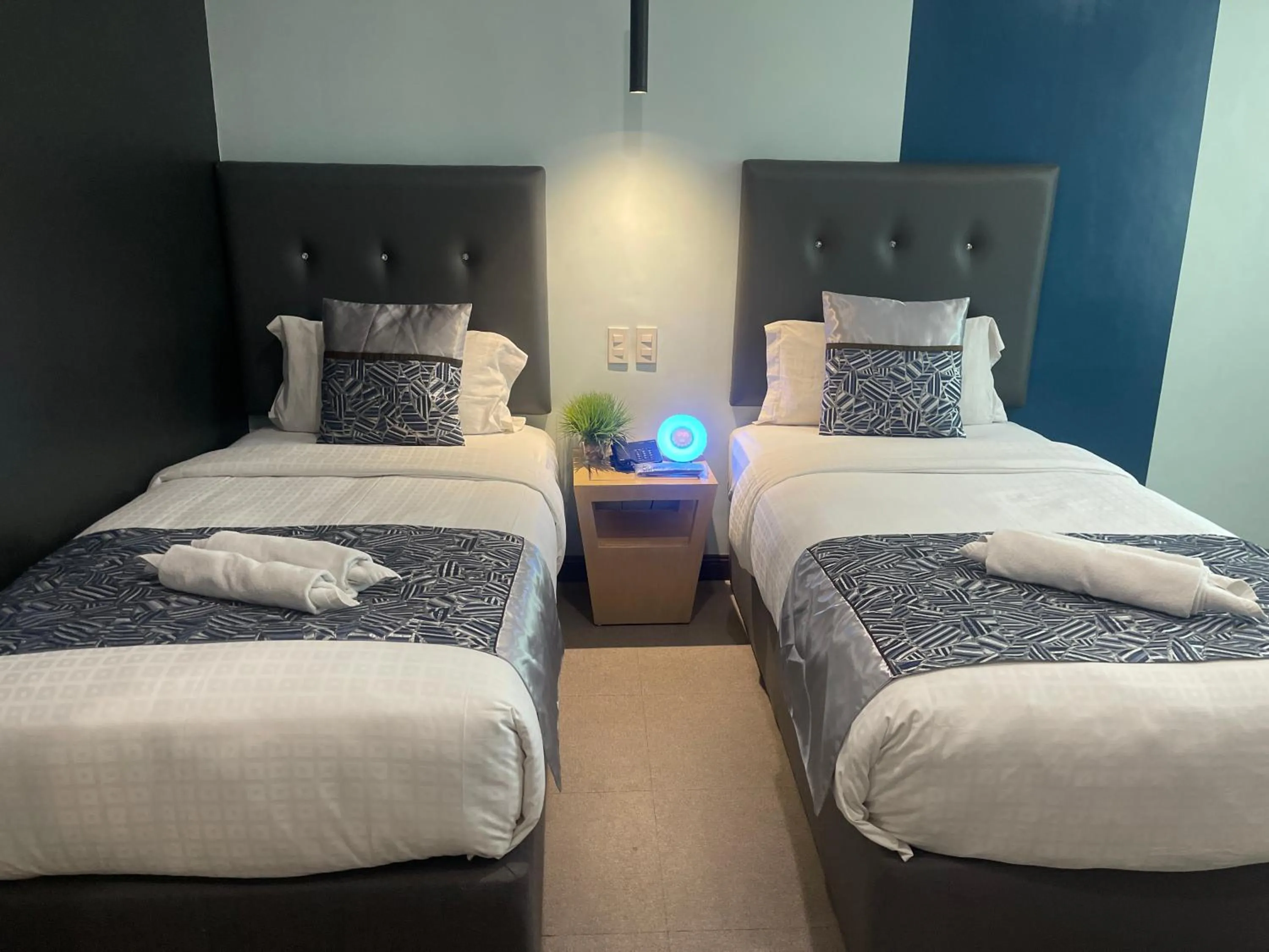 Bed in Homes at Bay Area Suites by SMS Hospitality