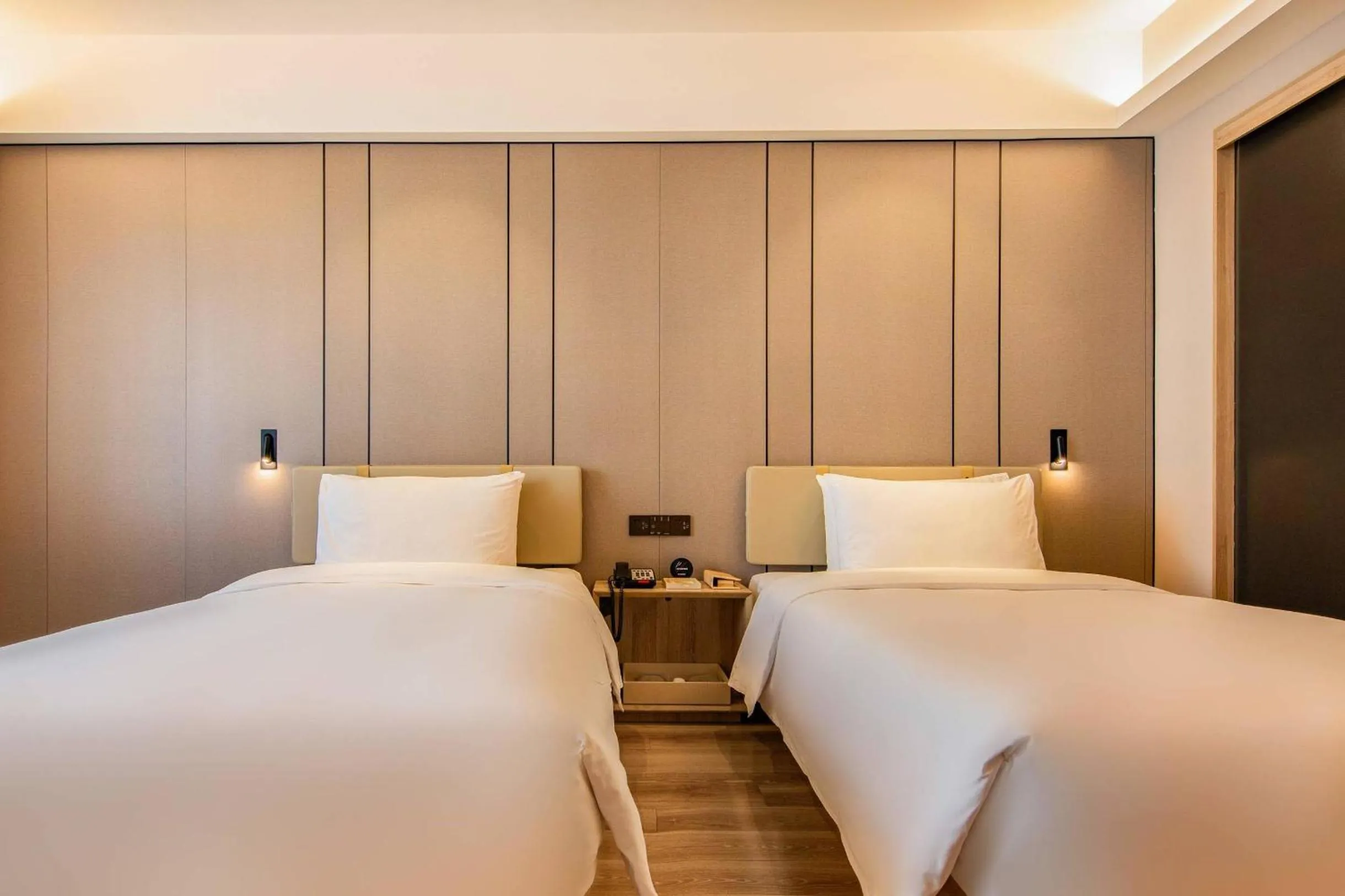 Bed in Atour Hotel Xujiahui Meiying