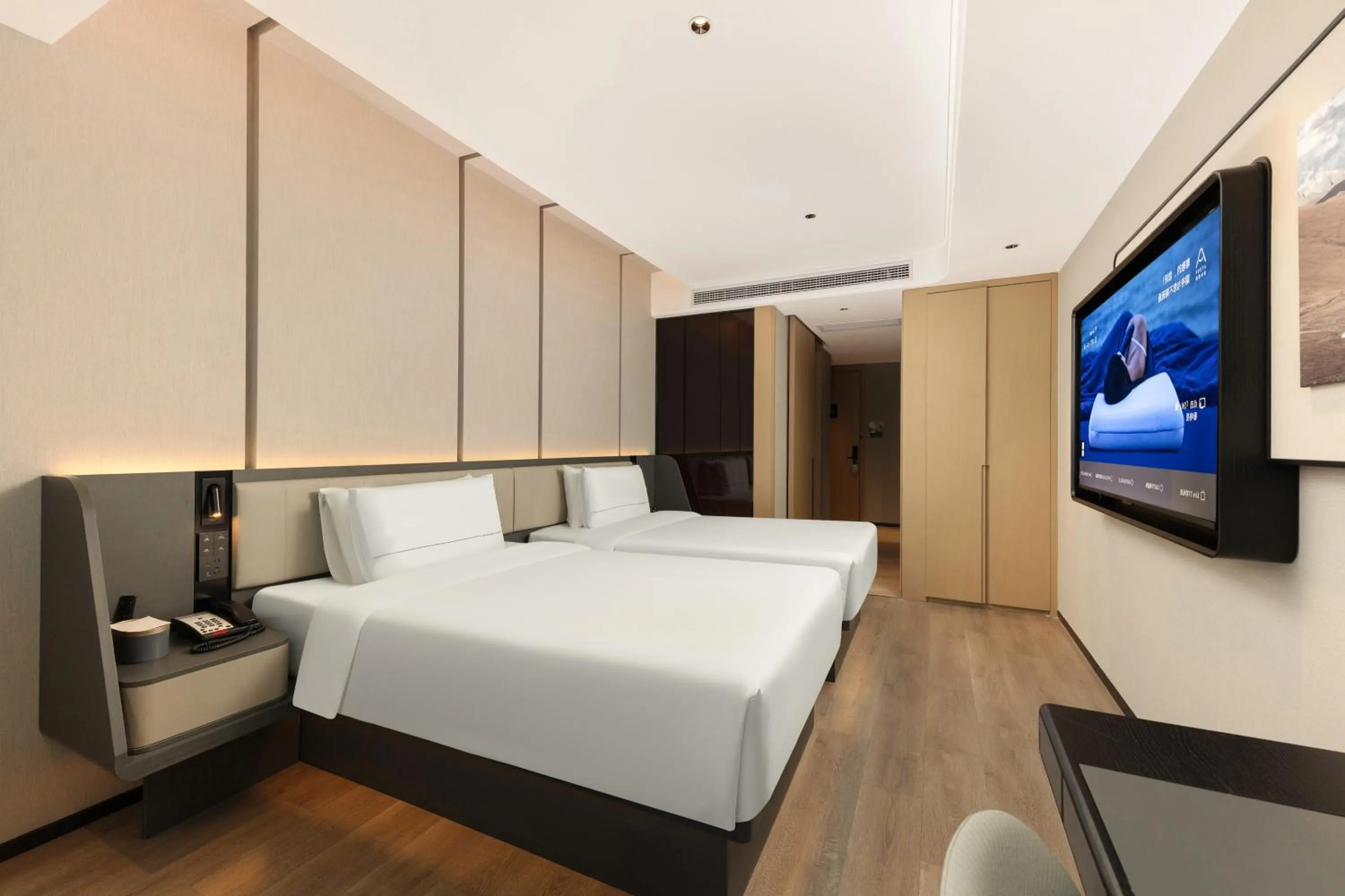 Bed in Atour Hotel Hangzhou Binjiang Olympic Sports