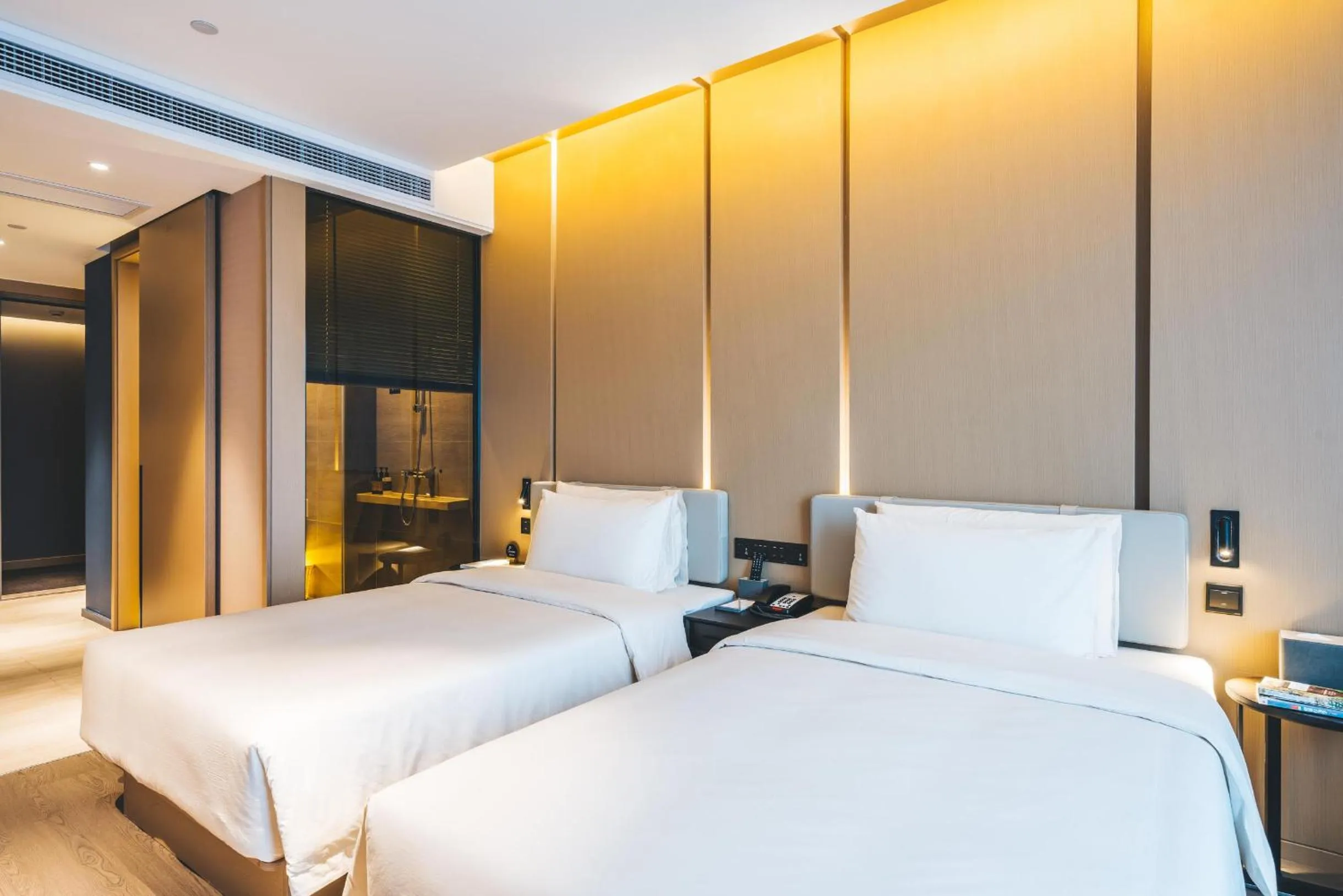 Bed in Atour Hotel Hangzhou Binjiang Olympic Sports