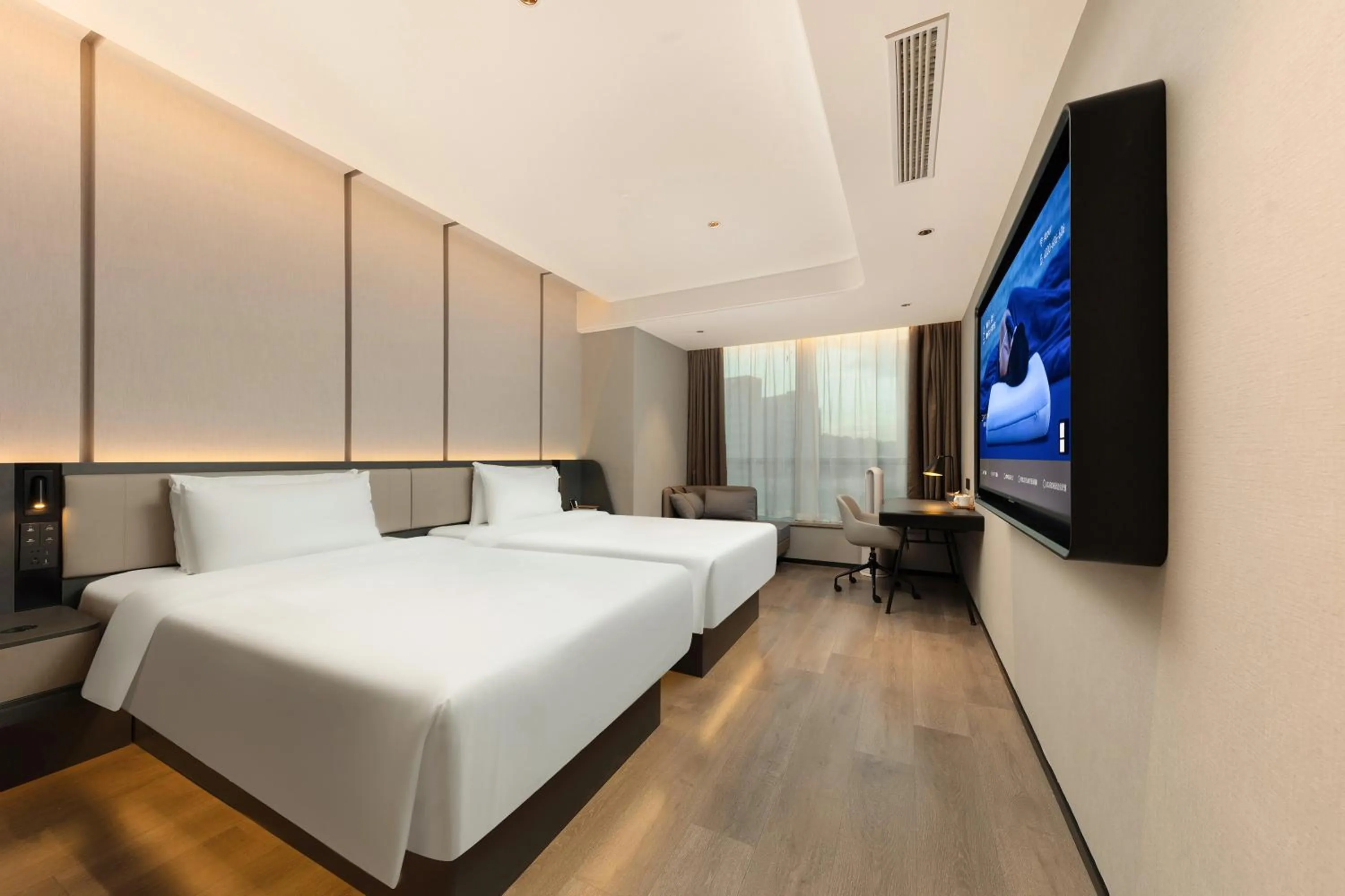Bed in Atour Hotel Hangzhou Binjiang Olympic Sports