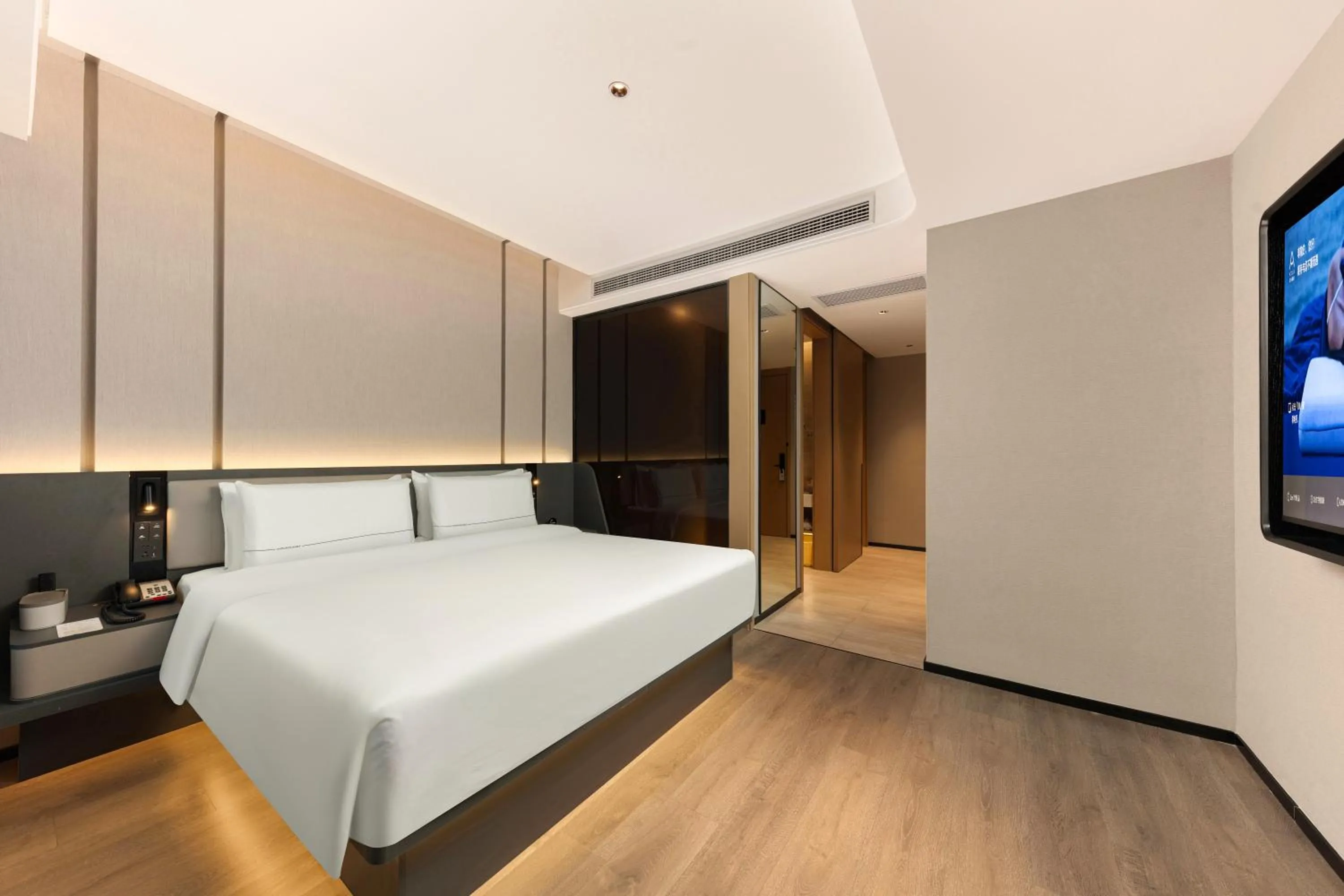 Bed in Atour Hotel Hangzhou Binjiang Olympic Sports