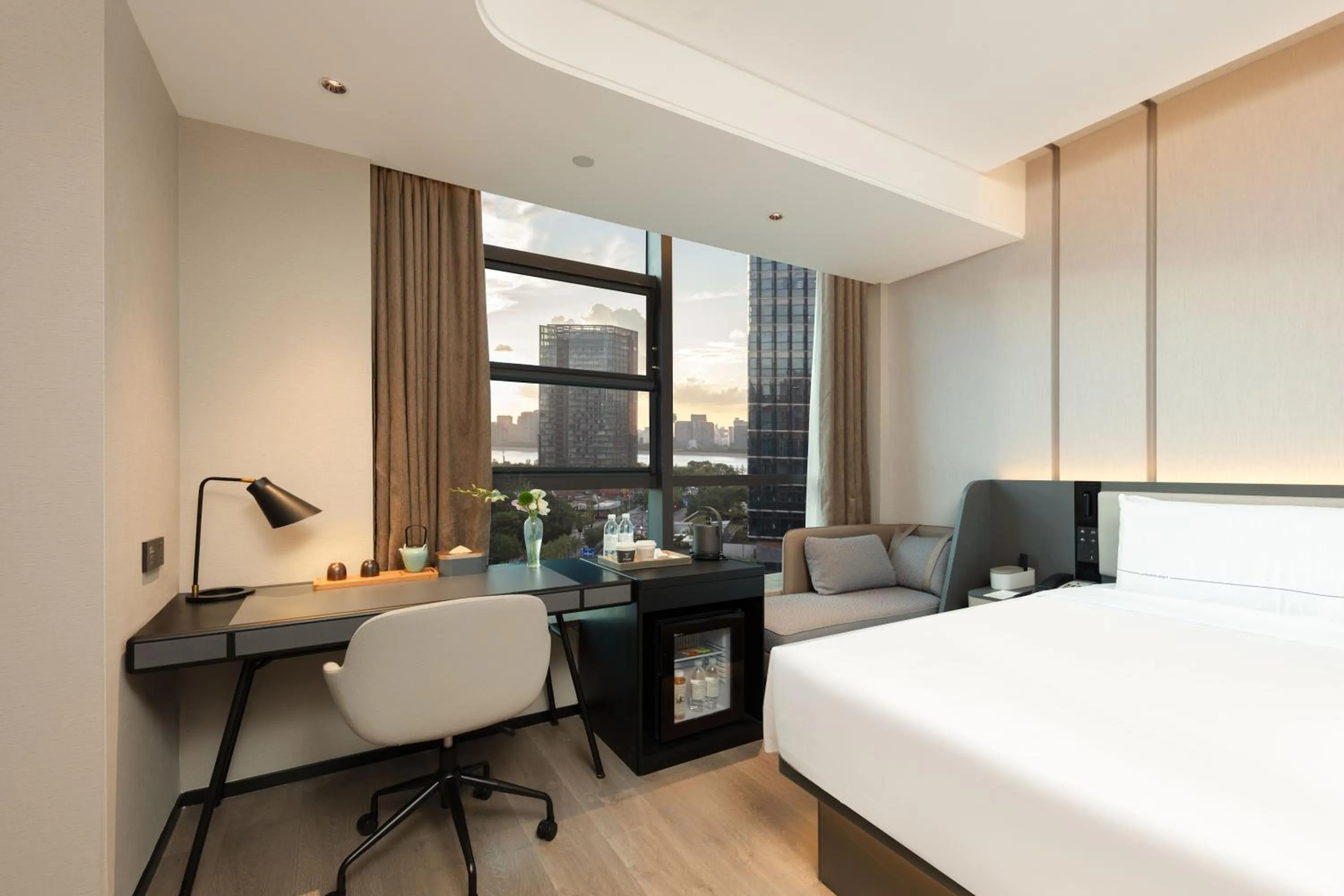 Bed in Atour Hotel Hangzhou Binjiang Olympic Sports