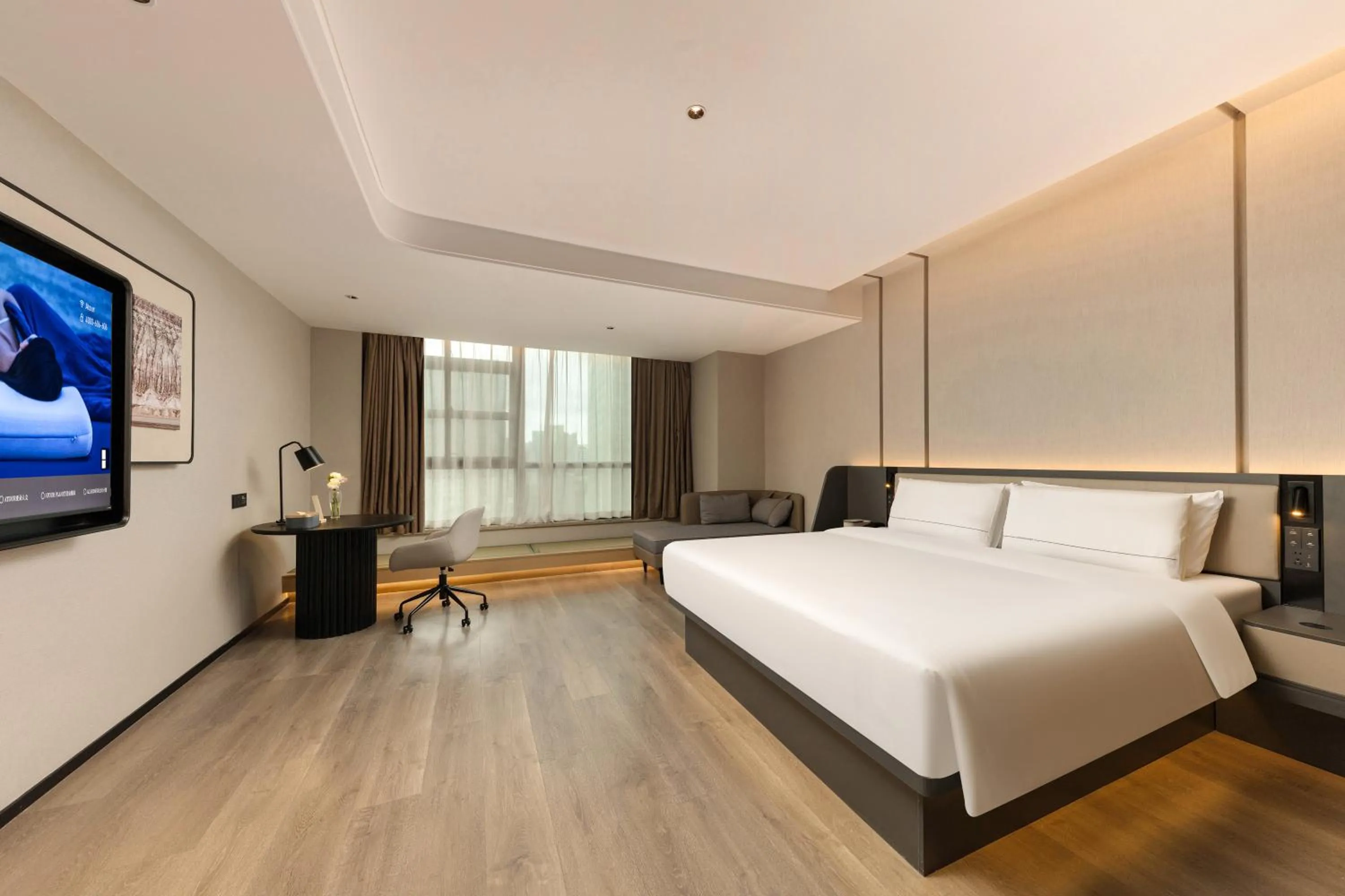 Bed in Atour Hotel Hangzhou Binjiang Olympic Sports