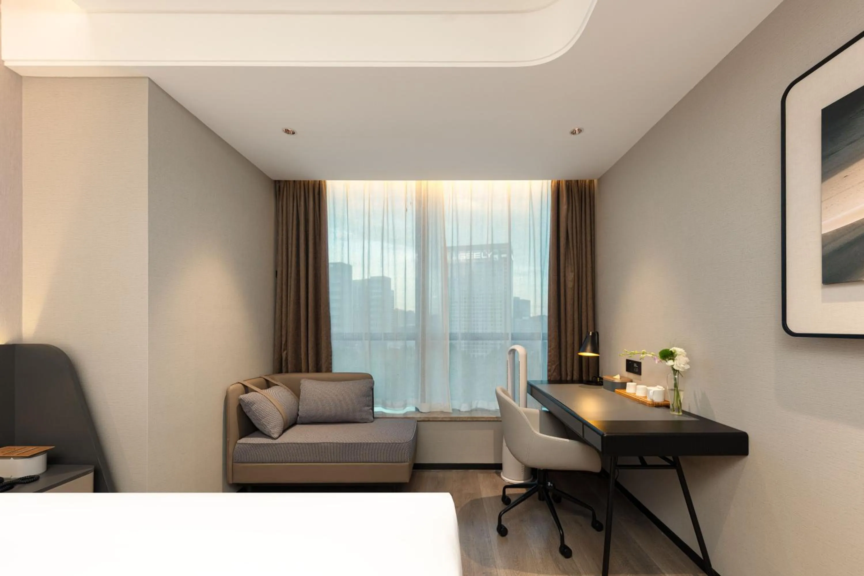 Seating area, Bed in Atour Hotel Hangzhou Binjiang Olympic Sports