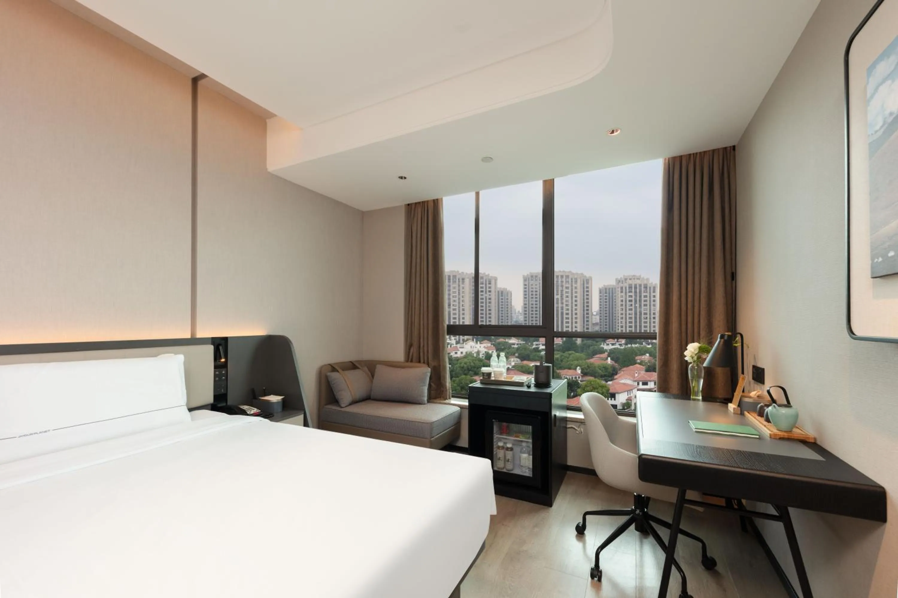 Bed in Atour Hotel Hangzhou Binjiang Olympic Sports