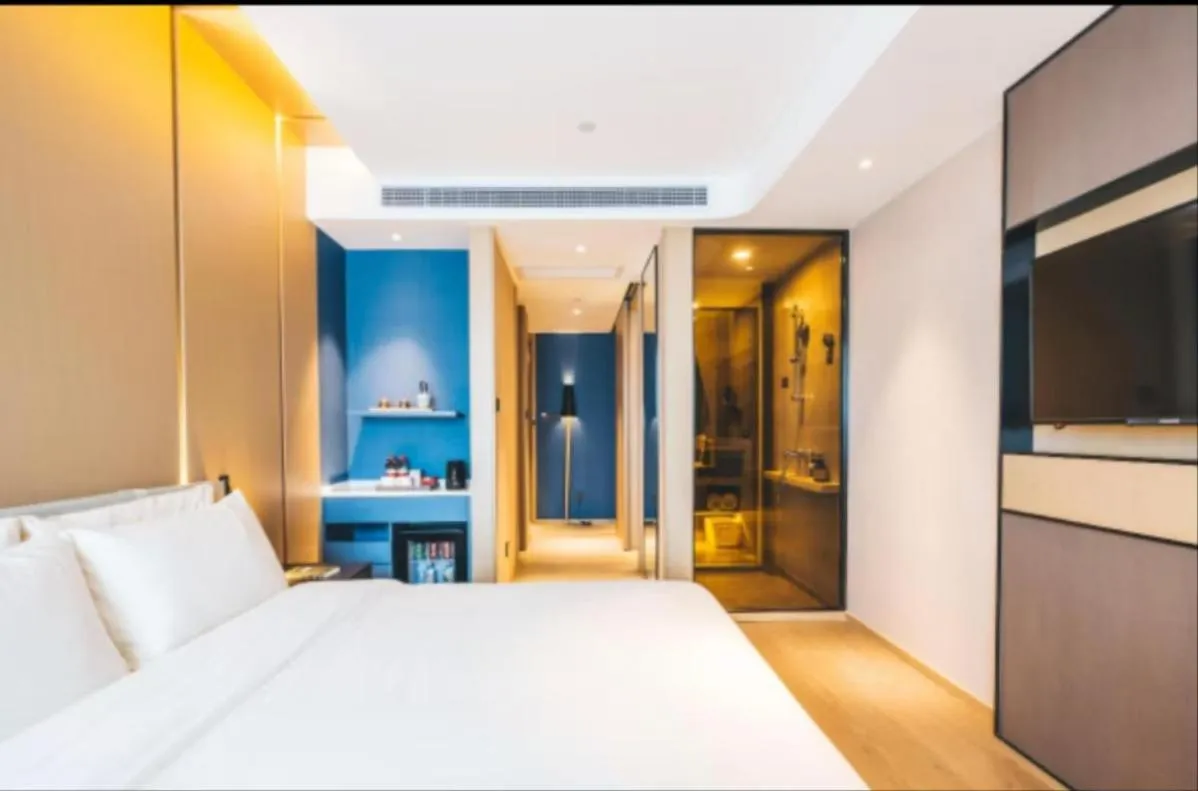 Bed in Atour Hotel Hangzhou Binjiang Olympic Sports