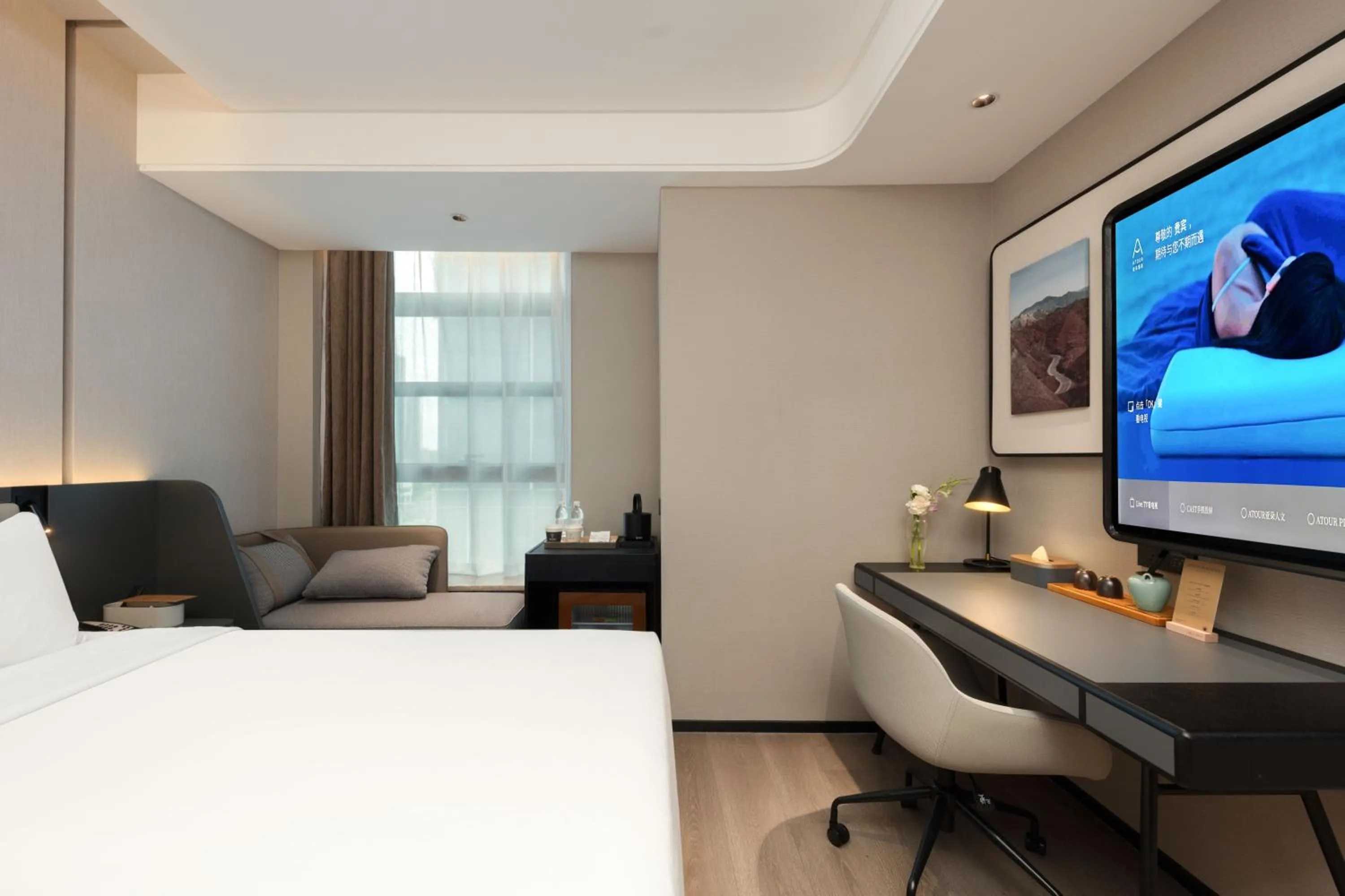 Bed in Atour Hotel Hangzhou Binjiang Olympic Sports