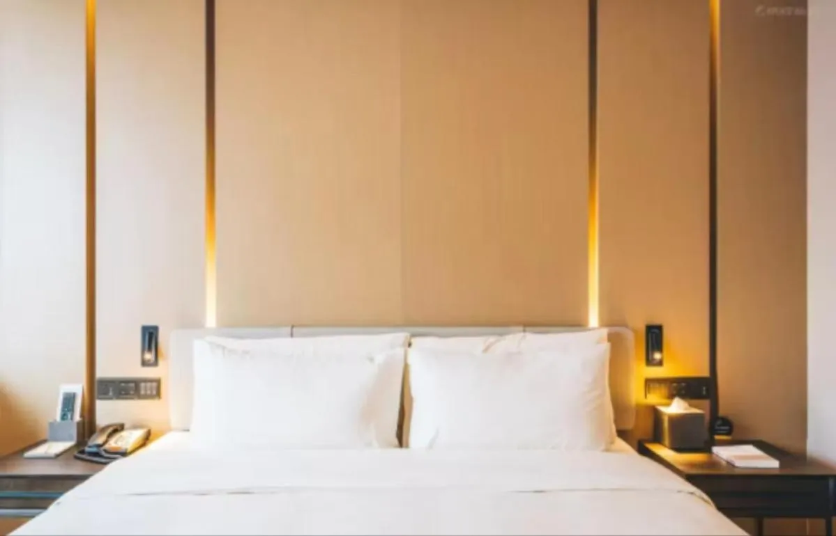 Bed in Atour Hotel Hangzhou Binjiang Olympic Sports