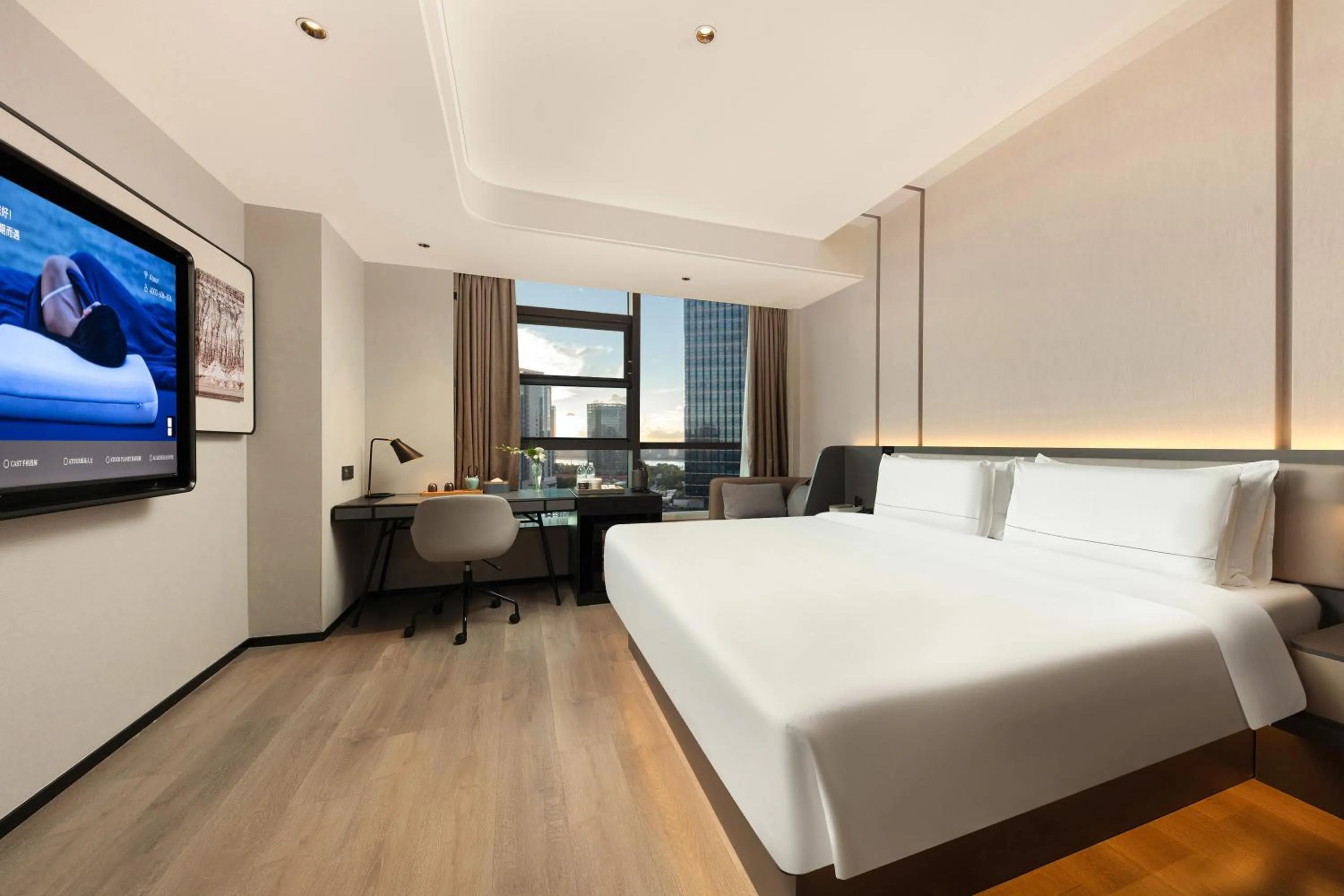 Bed in Atour Hotel Hangzhou Binjiang Olympic Sports