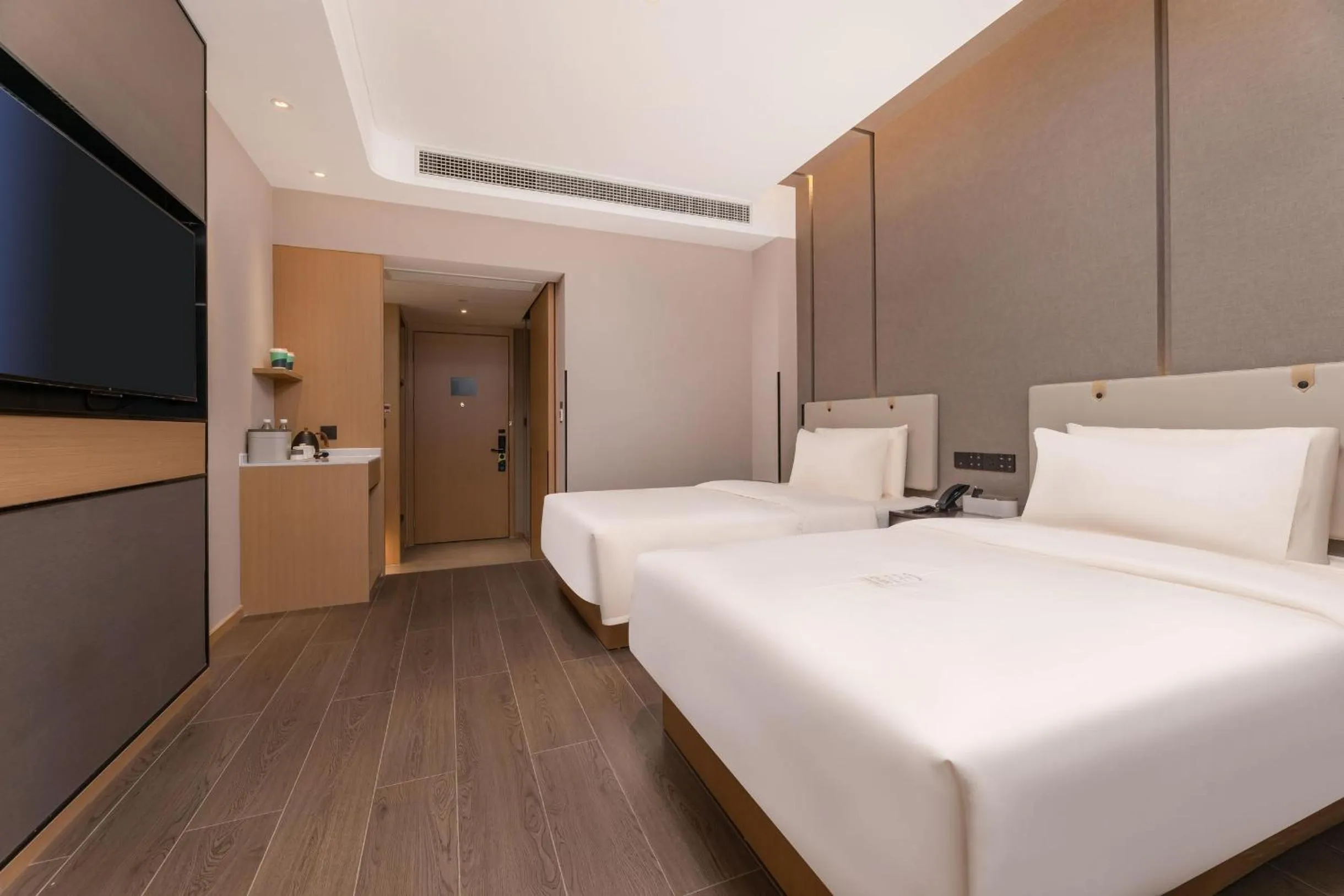 Bed in Atour Hotel Zhijiang Bridge