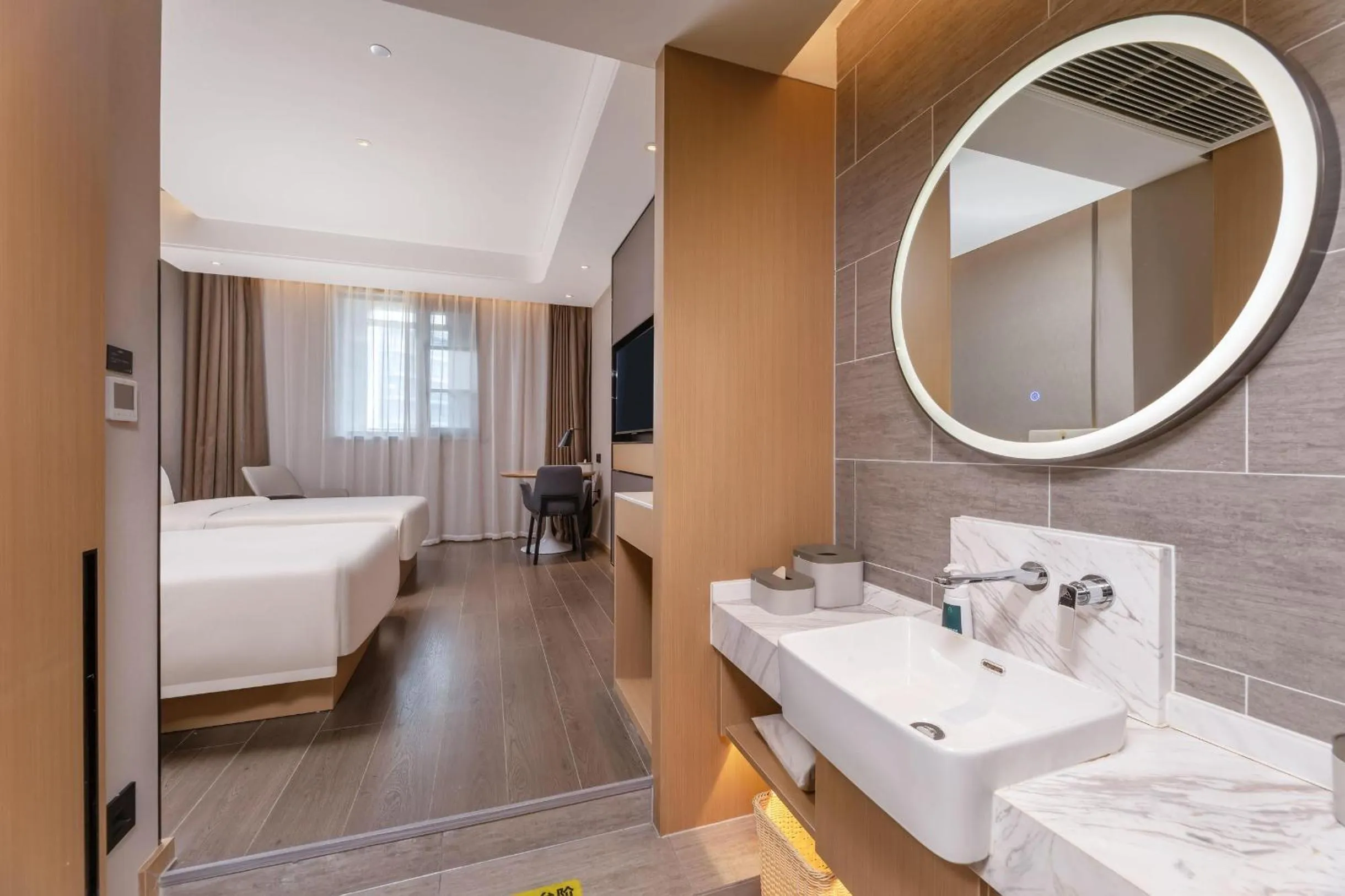 Bed in Atour Hotel Zhijiang Bridge