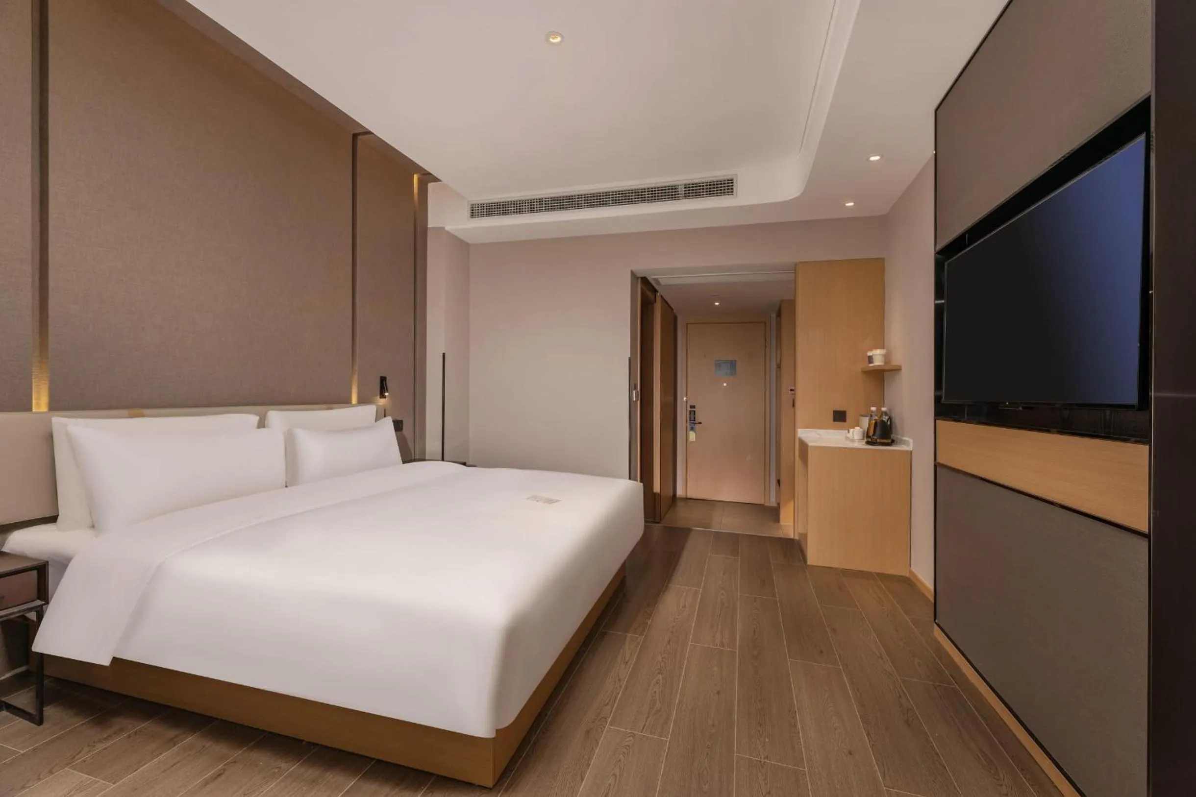 Bed in Atour Hotel Zhijiang Bridge