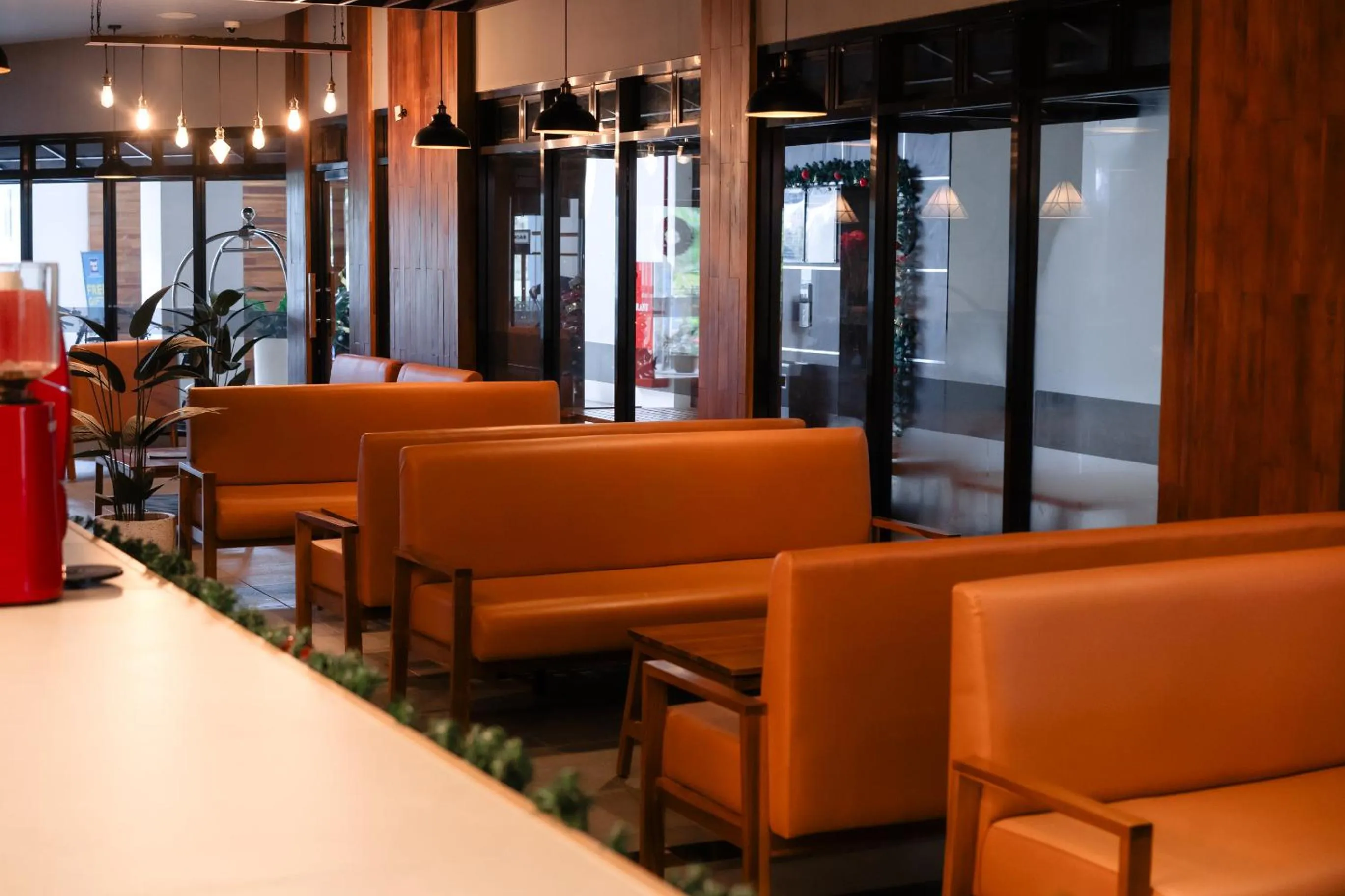 Communal lounge/ TV room in Zasgo Hotel