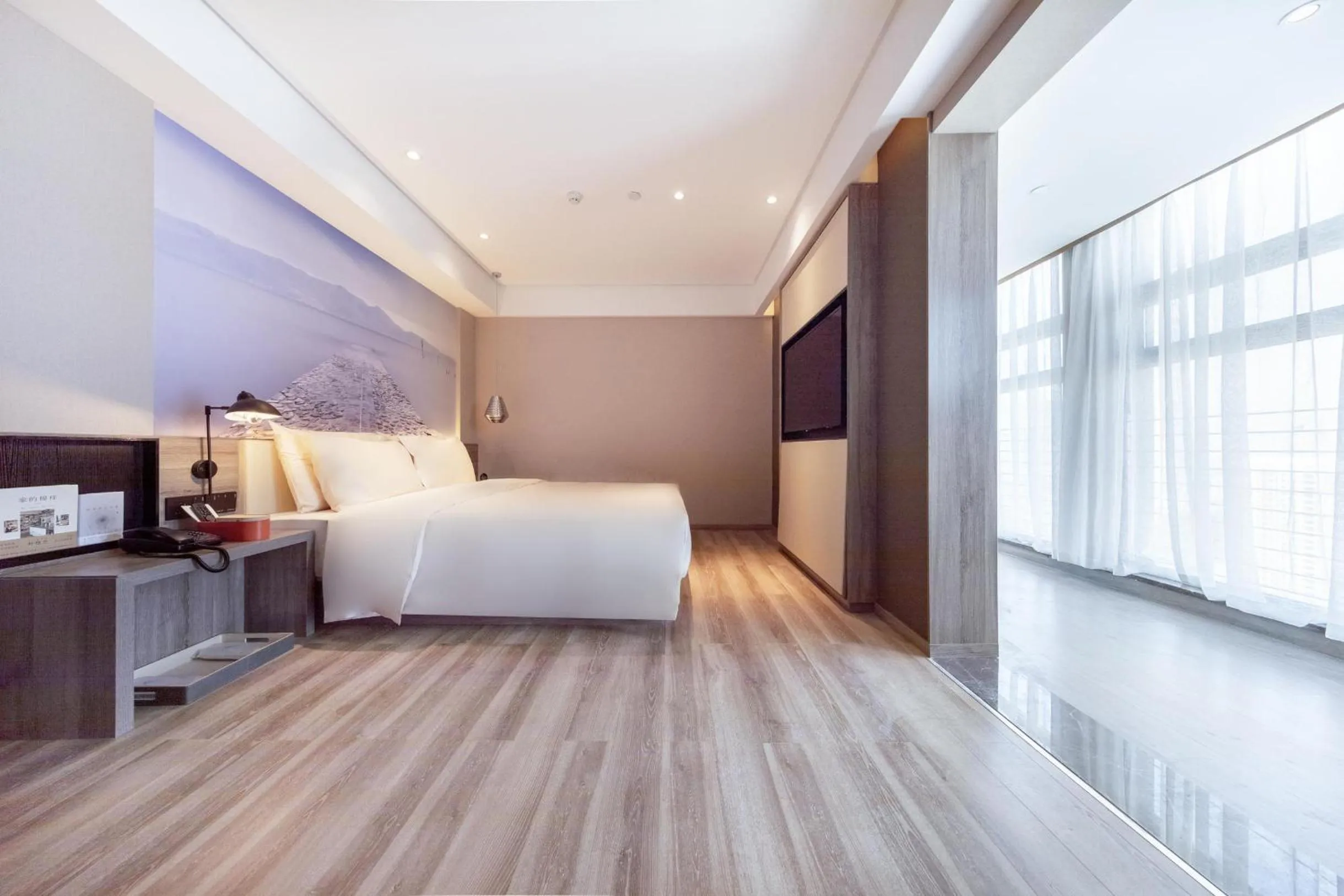 Bed in Atour Hotel Kunming South High Speed ​​Railway Station University Town