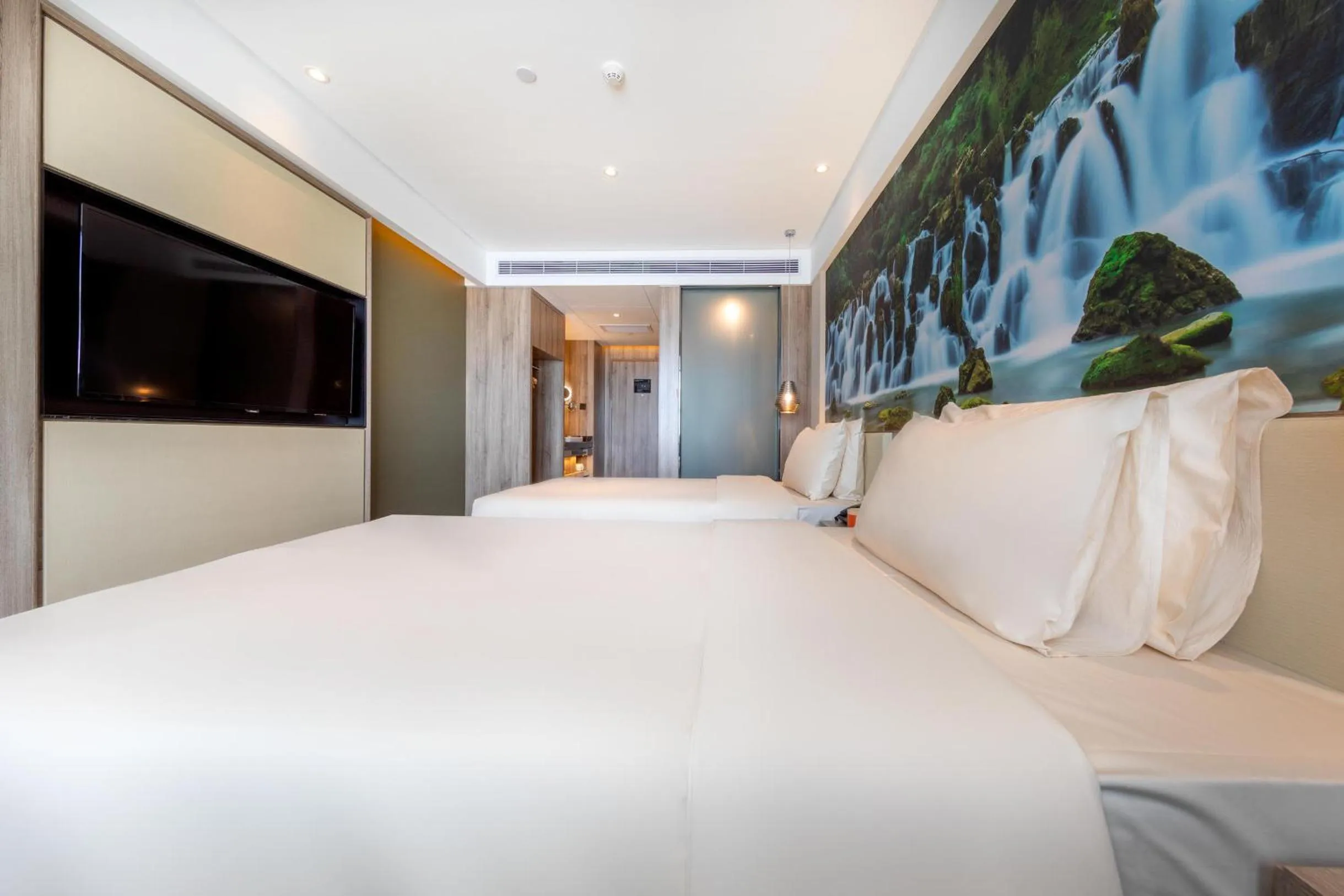 Bed in Atour Hotel Kunming South High Speed ​​Railway Station University Town