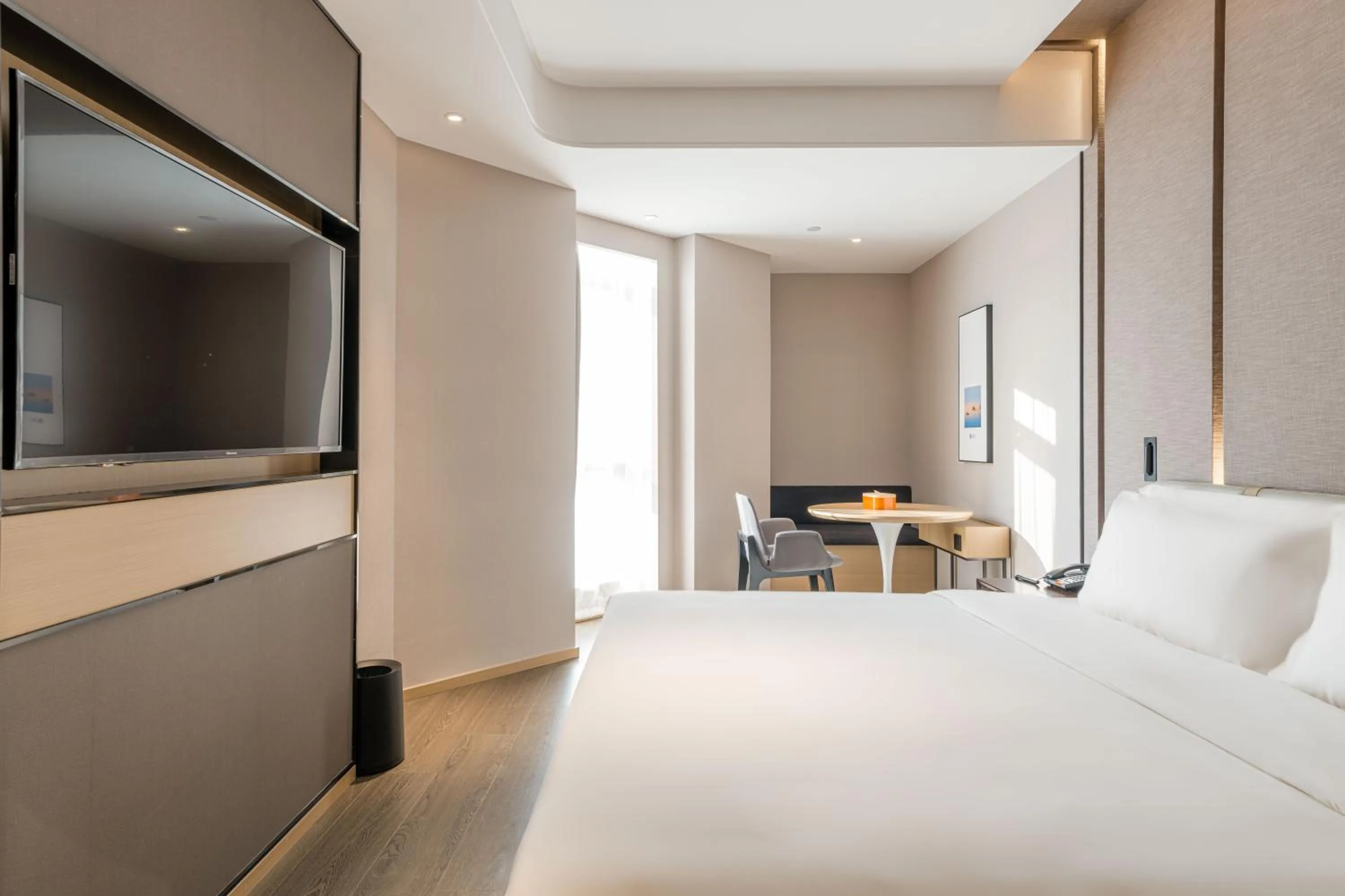 Bed in Atour Hotel Hangzhou Qianjiang Century City International Expo Center