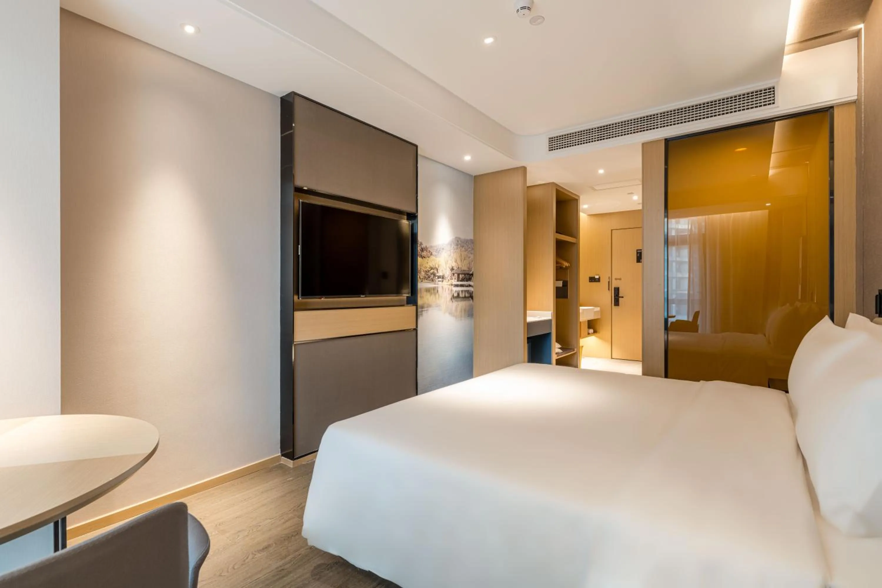 Bed in Atour Hotel Hangzhou Qianjiang Century City International Expo Center