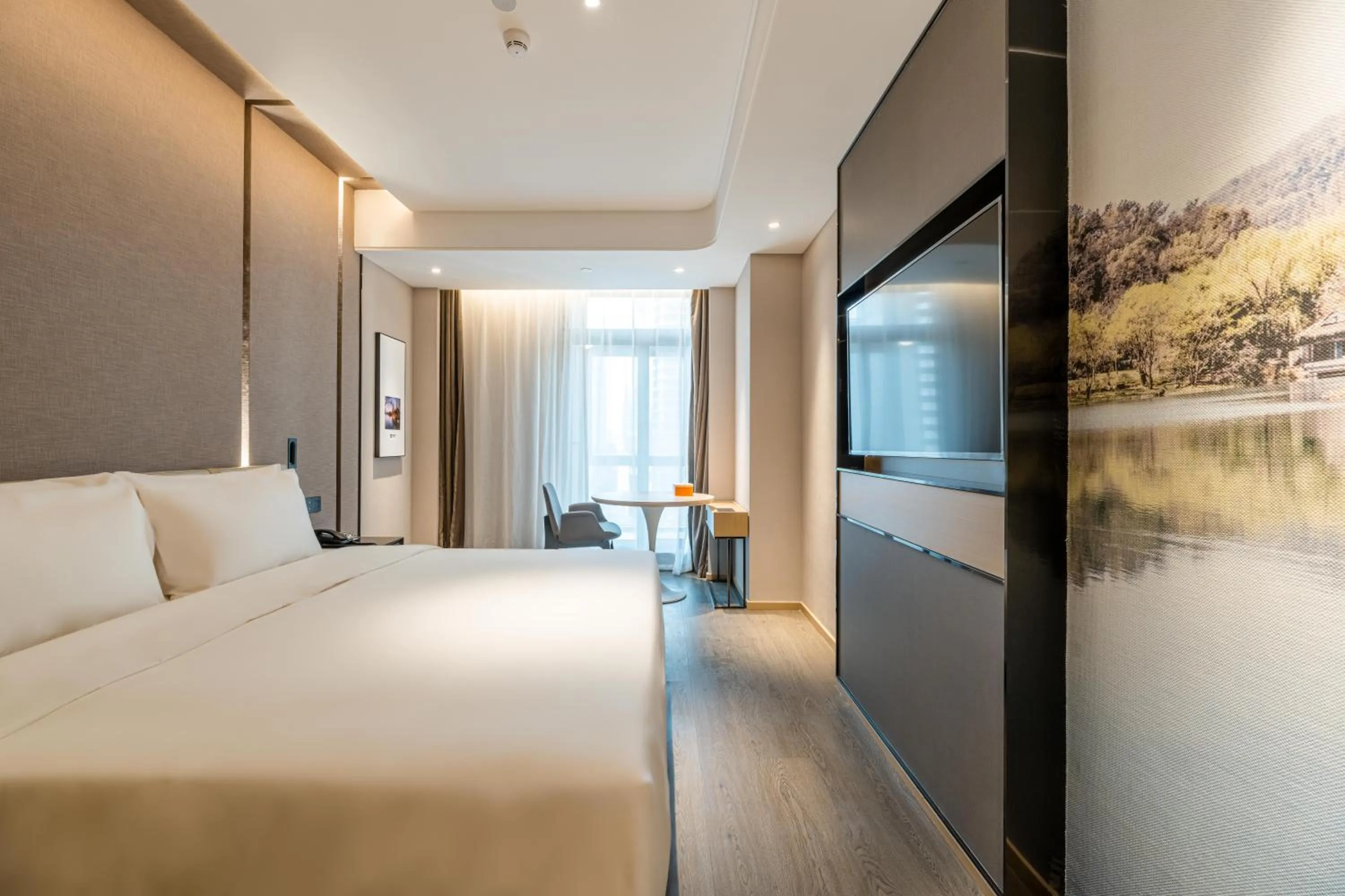 Bed in Atour Hotel Hangzhou Qianjiang Century City International Expo Center