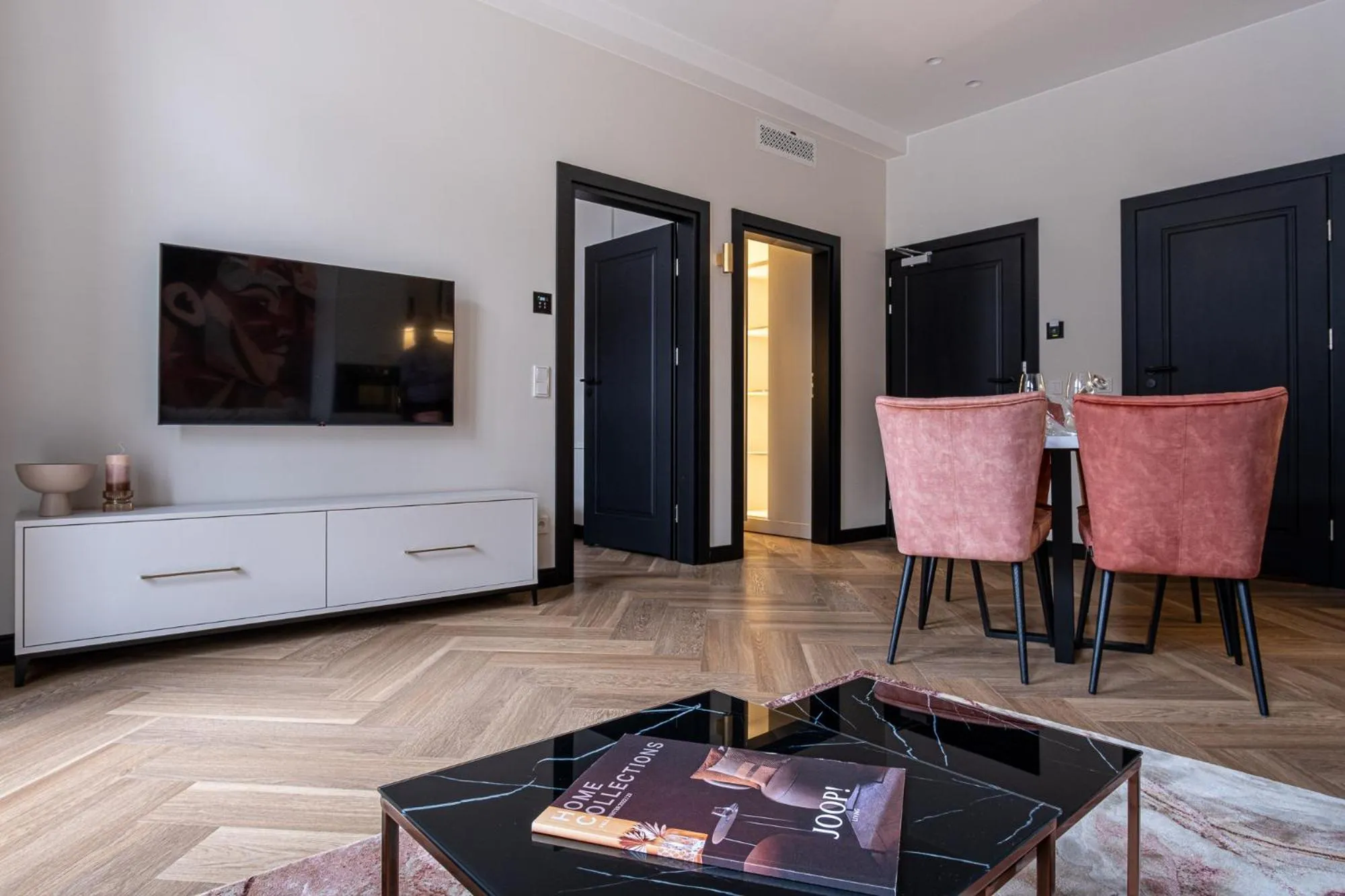 Communal lounge/ TV room in Carvala Boutique Apartments