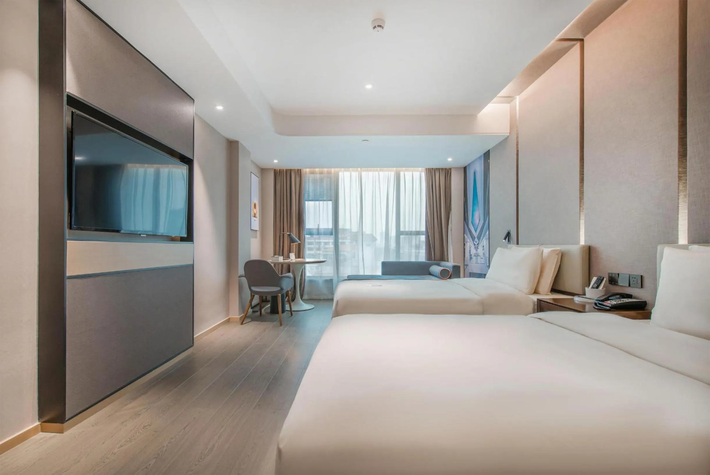 Bed in Atour Hotel Guangzhou Sanyuanli-Guangzhou Baiyun Railway-Fiee Self-Service Laundry