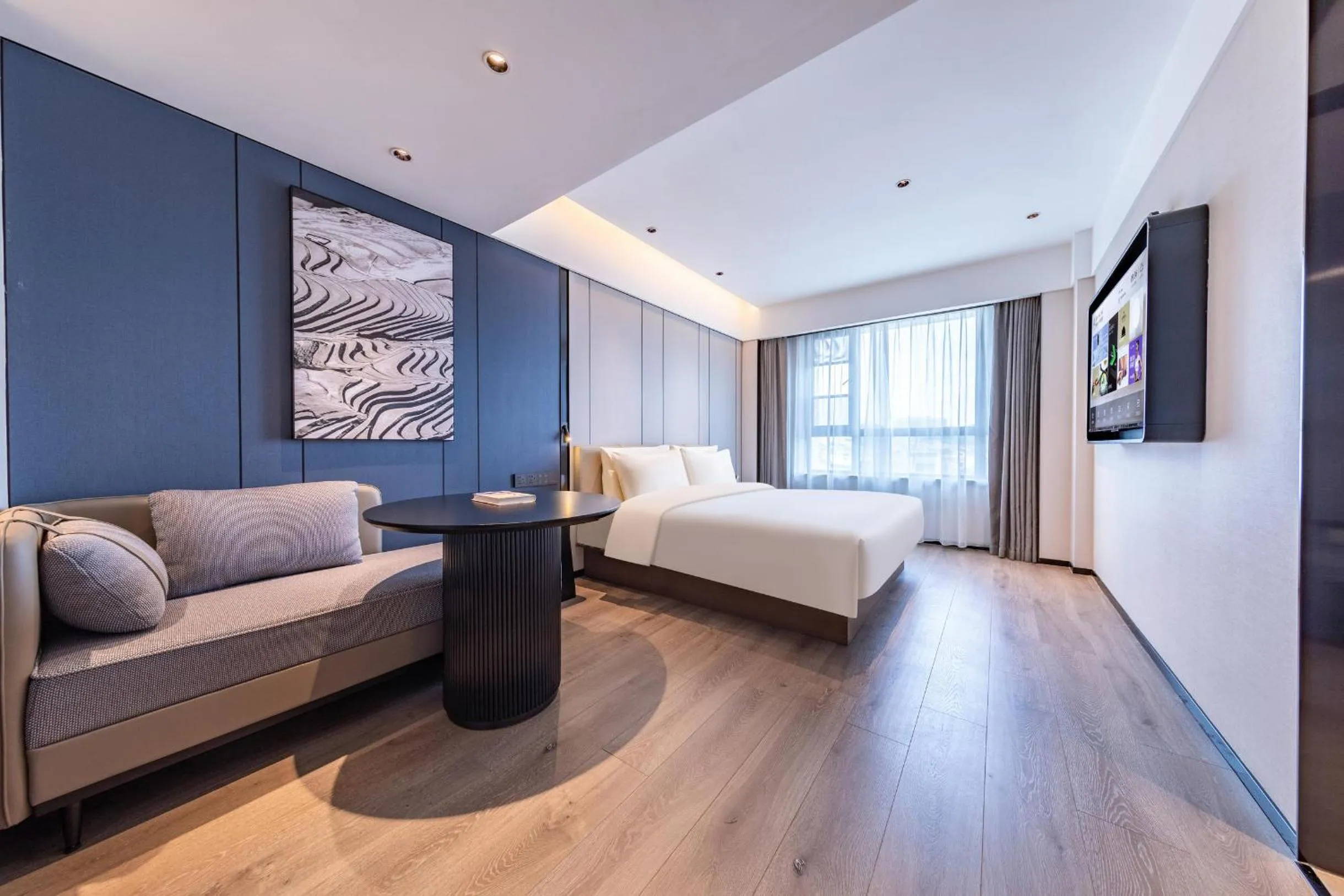 Photo of the whole room, Bed in Atour Hotel Guangzhou Zhongcun Hanxi Changlong Metro Station