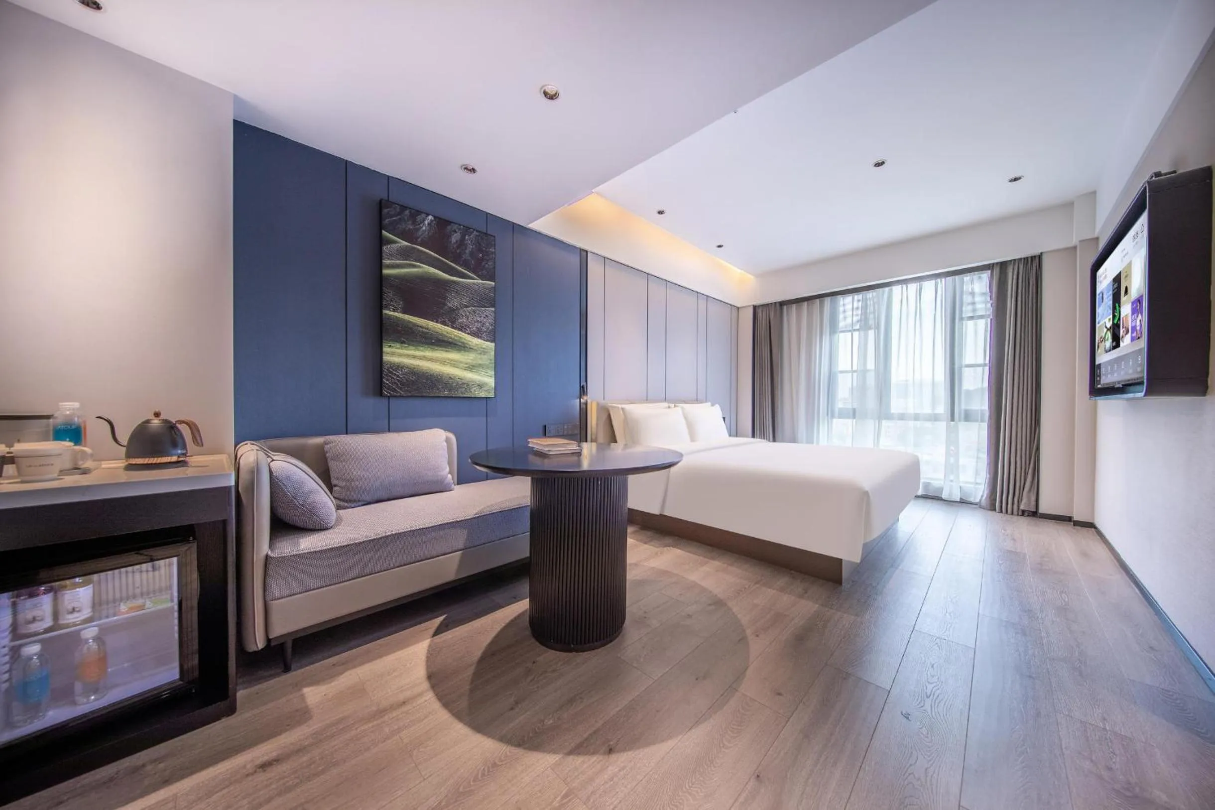 Photo of the whole room, Bed in Atour Hotel Guangzhou Zhongcun Hanxi Changlong Metro Station