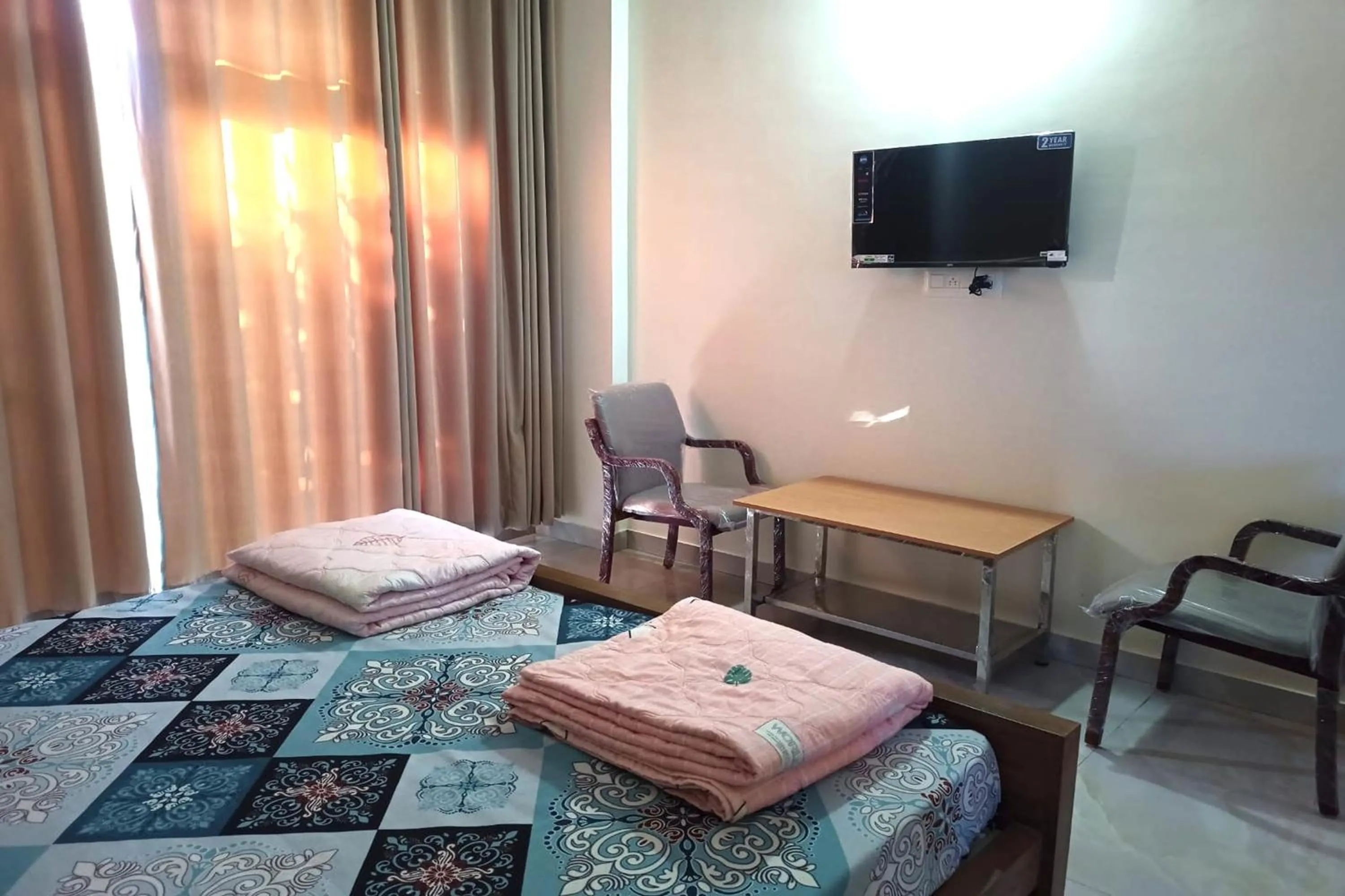 Bed in Dundi Mango Mist Resort