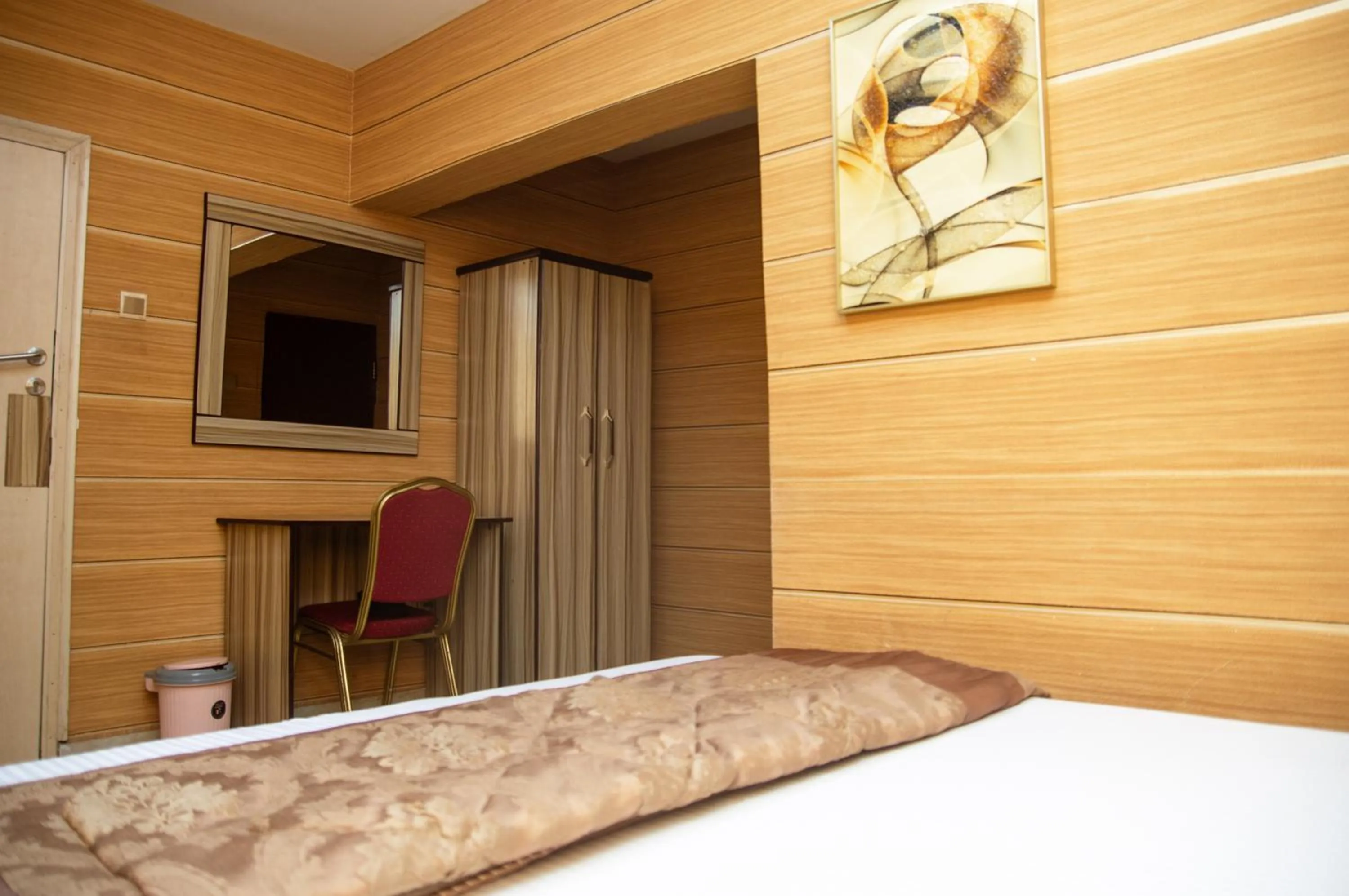 Photo of the whole room, Bed in Haffy Executive Hotels and Suite