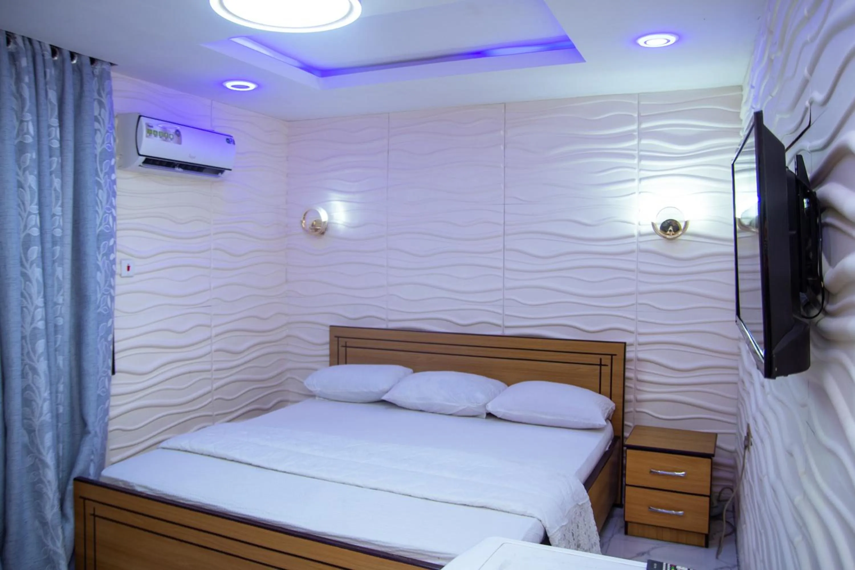 Bed in Haffy Executive Hotels and Suite