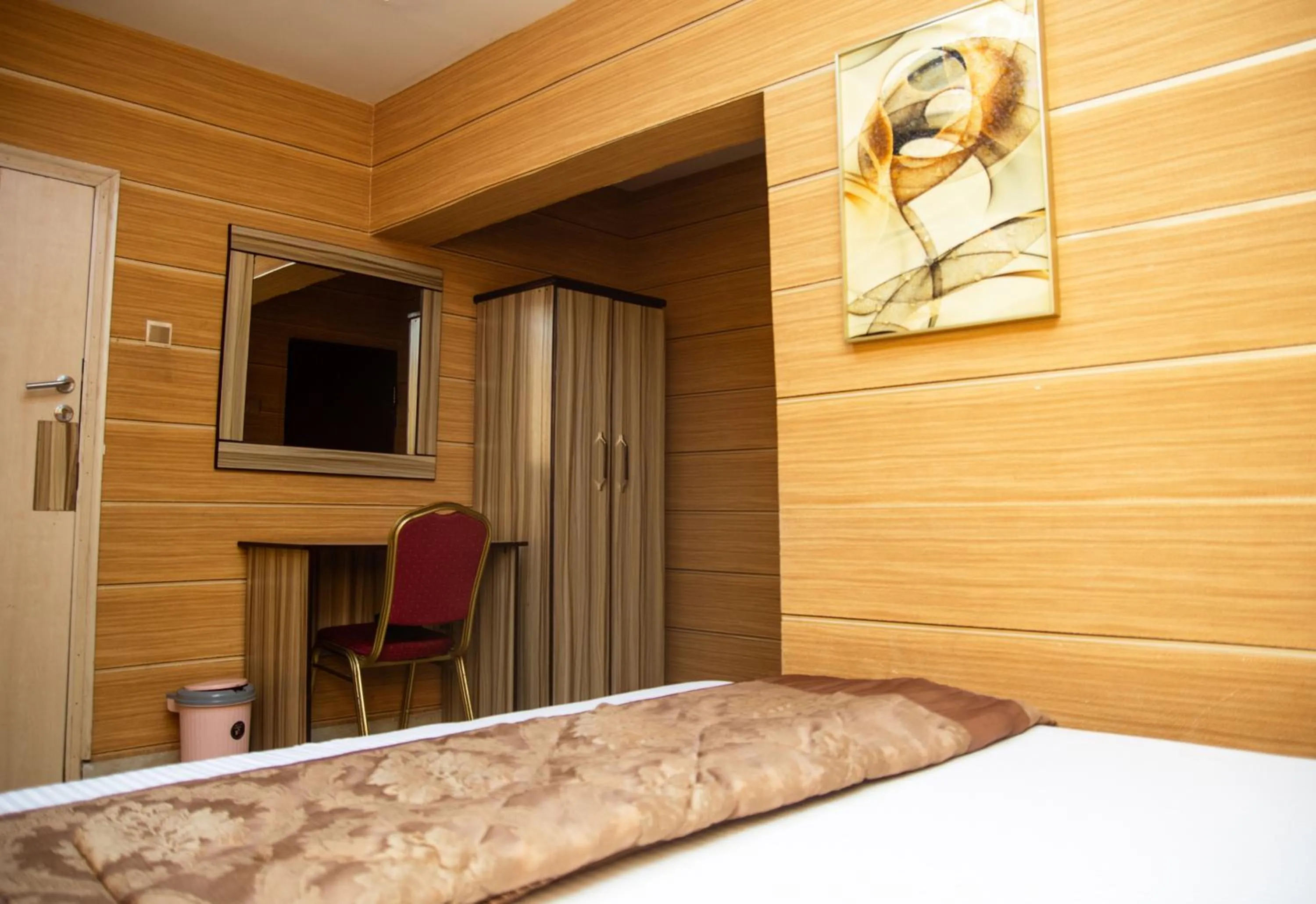 Bed in Haffy Executive Hotels and Suite