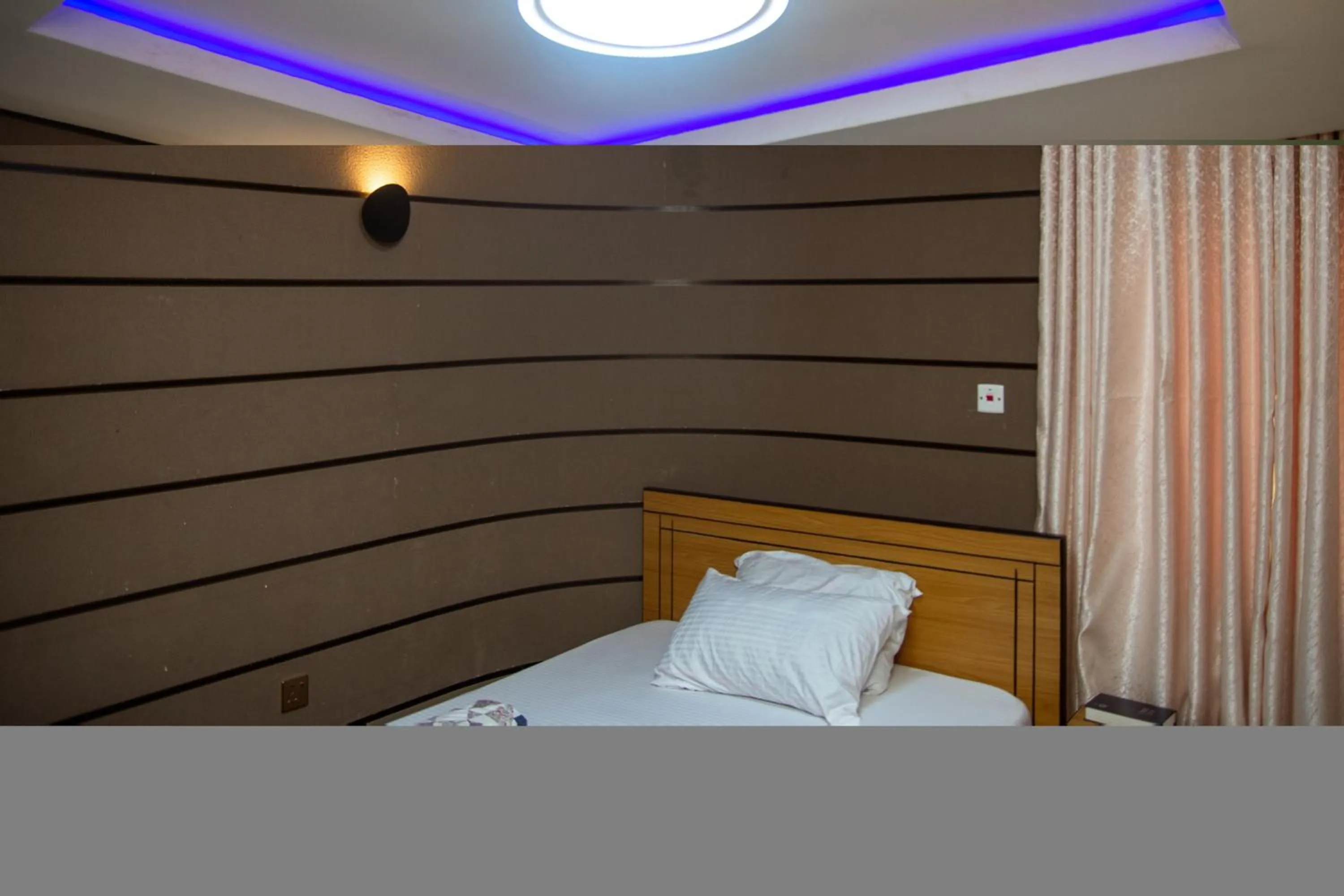 Bed in Haffy Executive Hotels and Suite