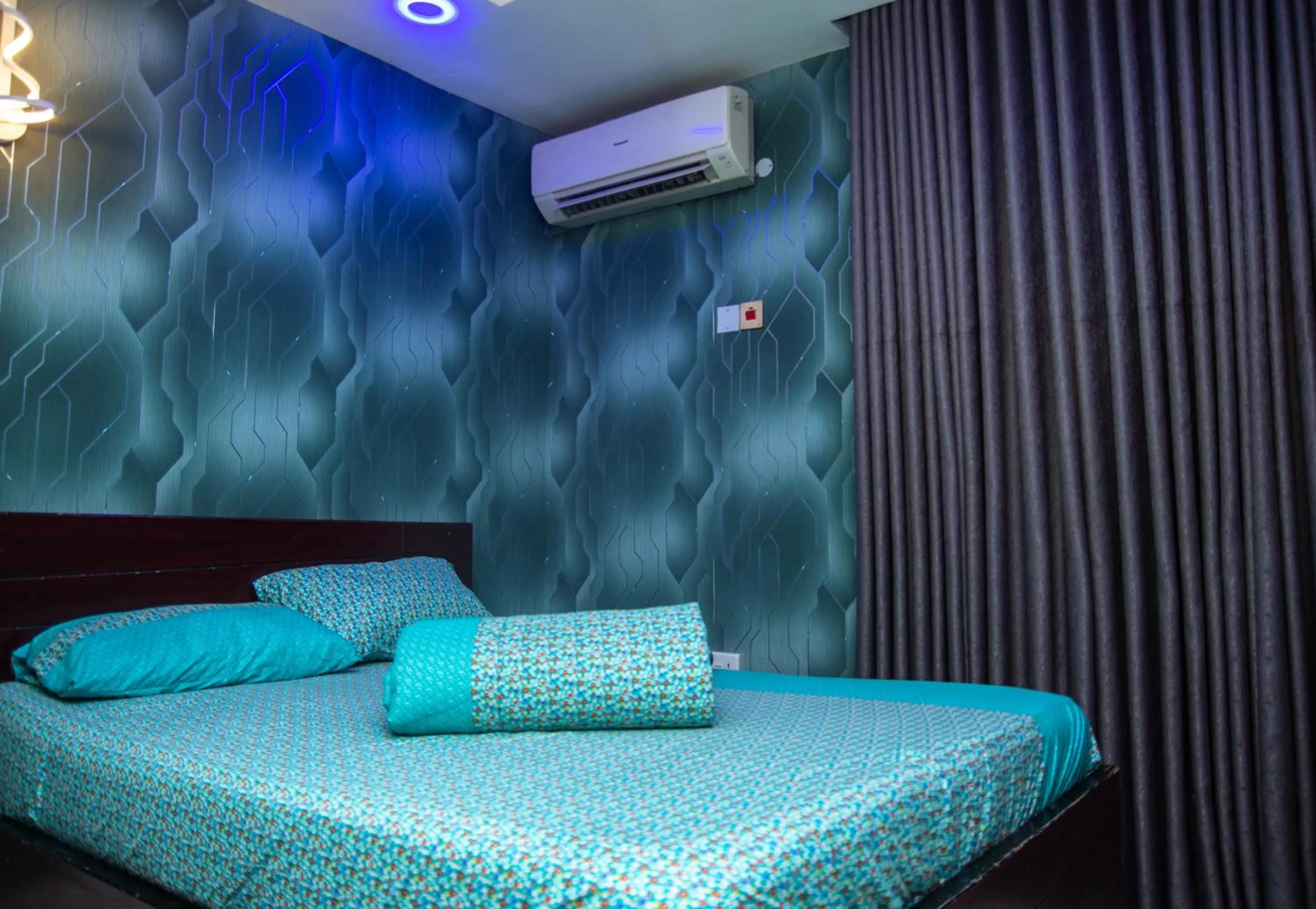 Bed in Haffy Executive Hotels and Suite