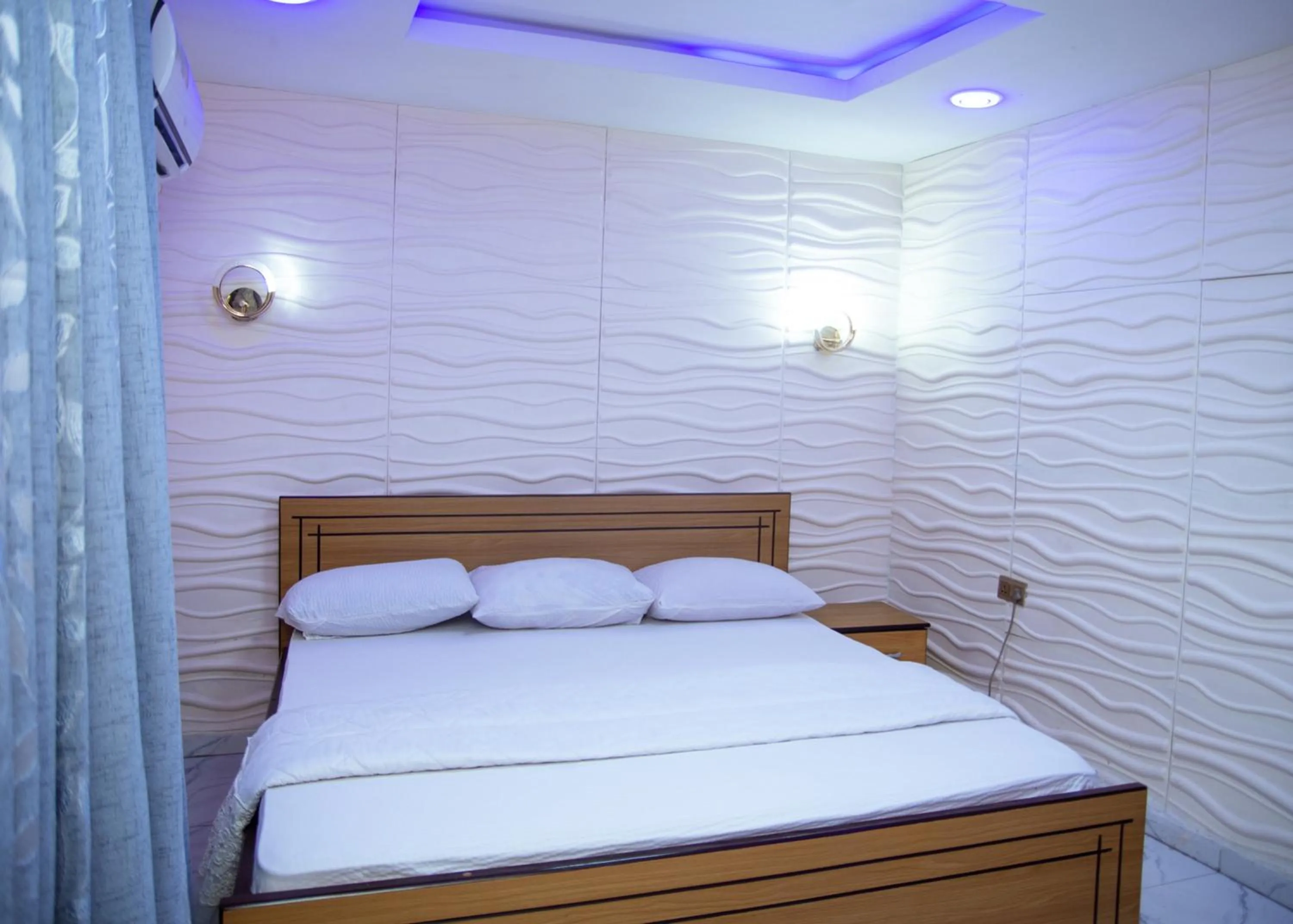 Photo of the whole room, Bed in Haffy Executive Hotels and Suite