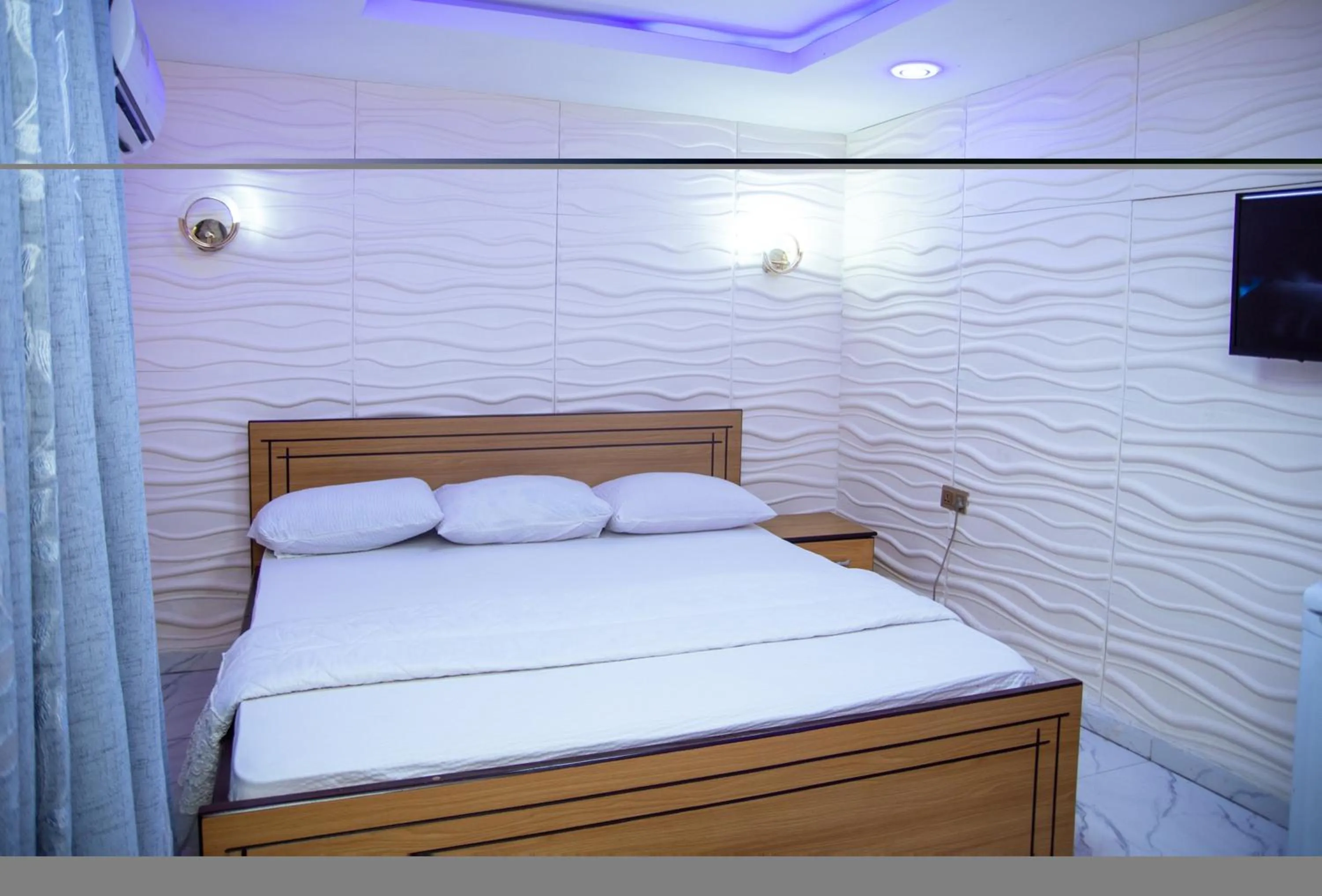 Photo of the whole room, Bed in Haffy Executive Hotels and Suite