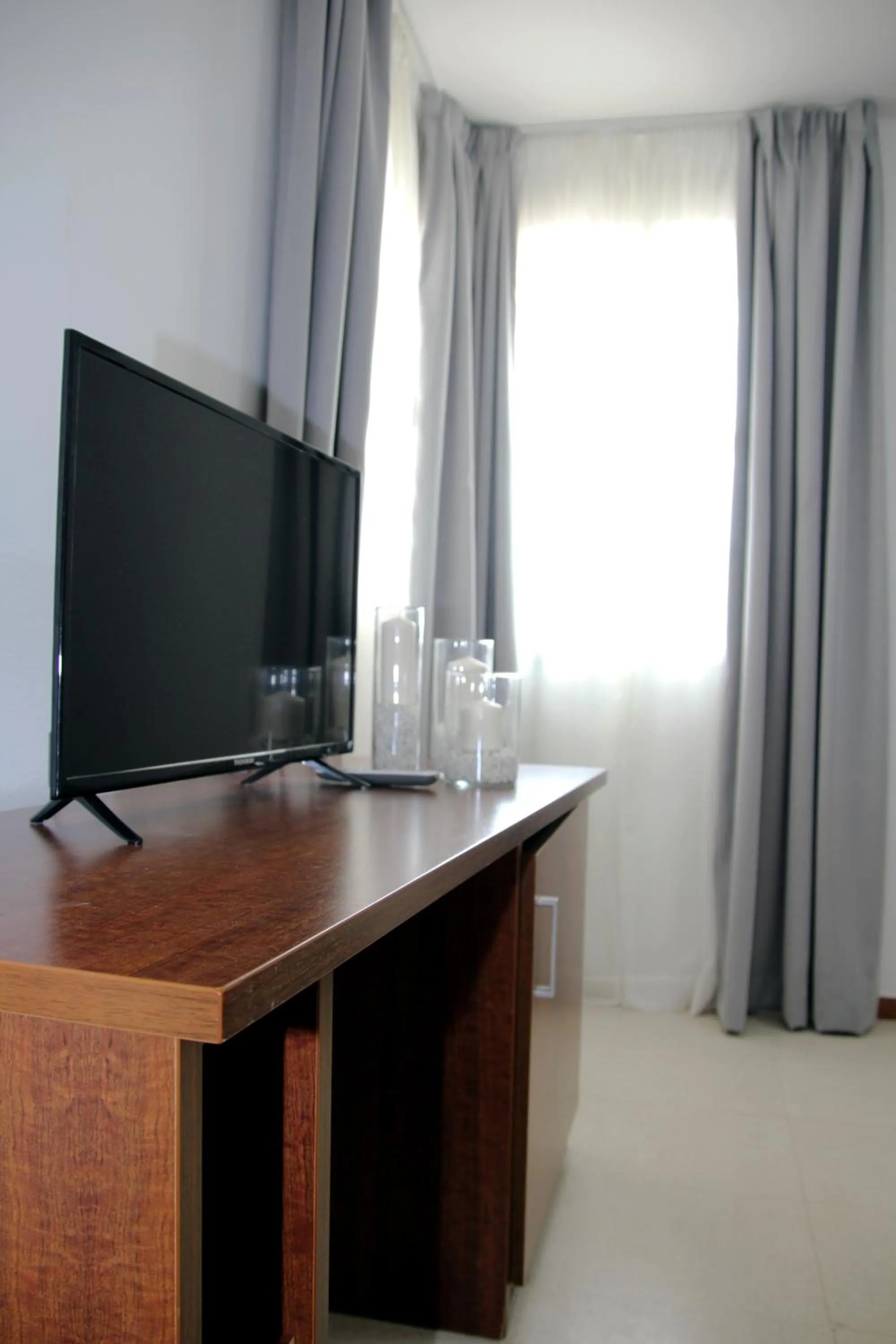 TV and multimedia in Hospedium Hotel Sky Blu Torre de Sevilla