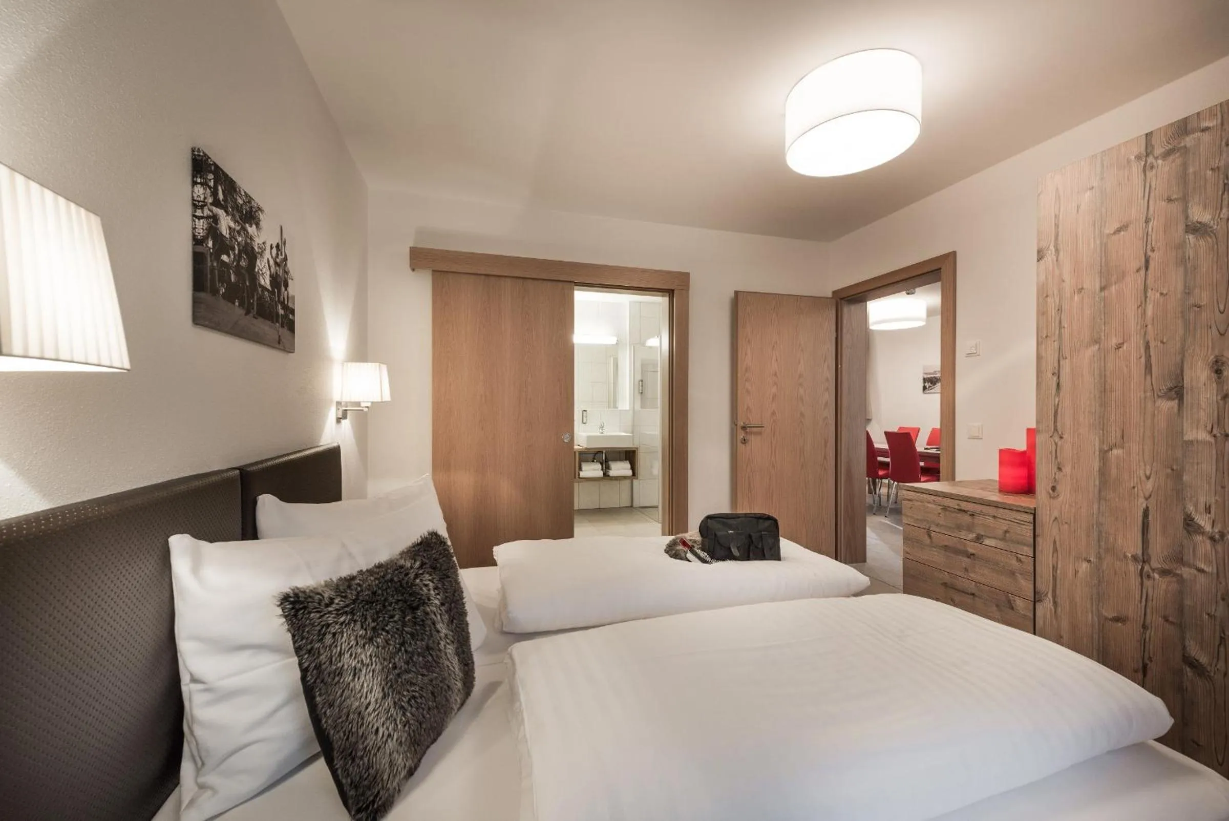 Bedroom, Bed in AlpenParks Hotel & Apartment Central Zell am See