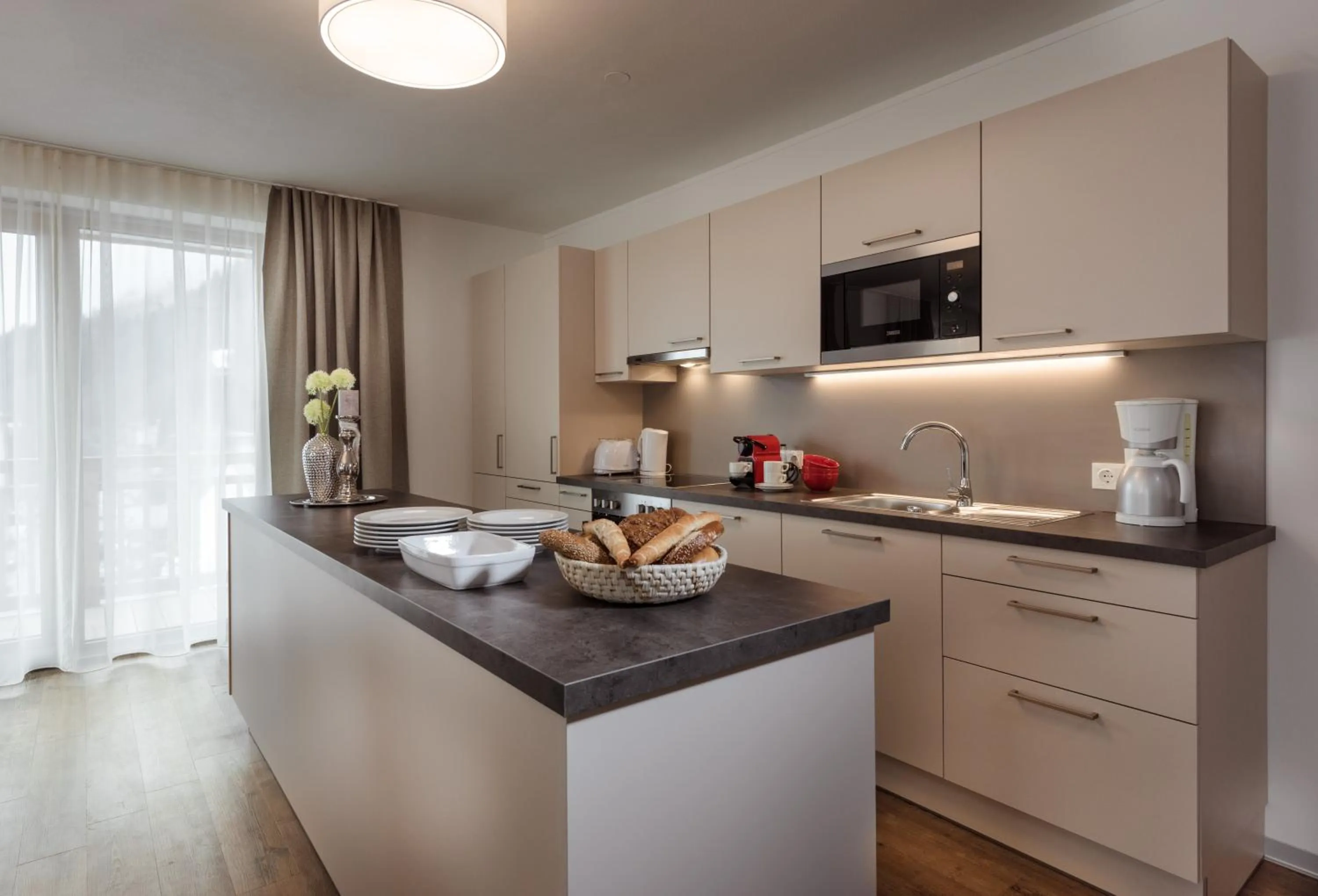 kitchen in AlpenParks Hotel & Apartment Central Zell am See