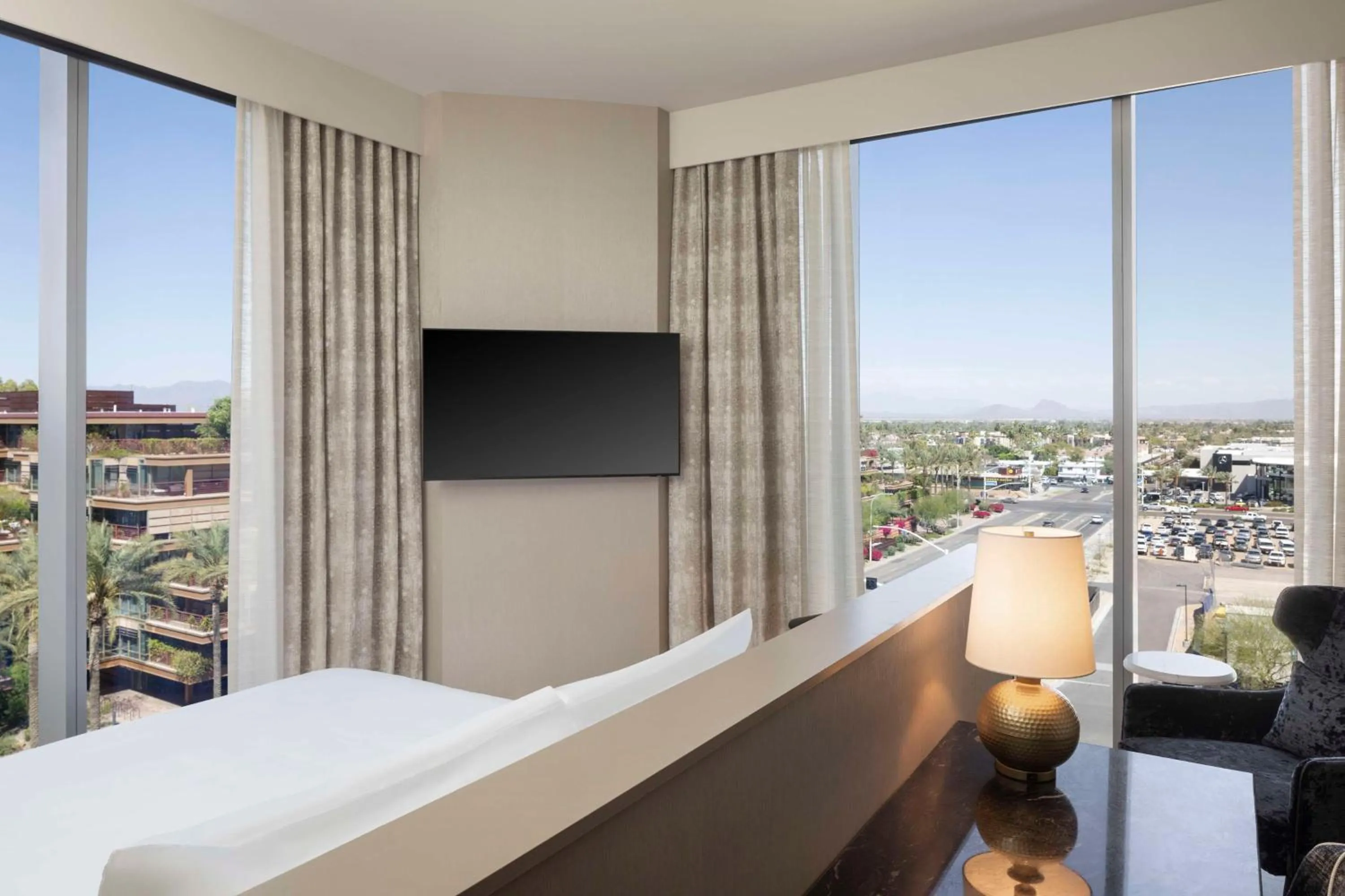 Living room, Bed in Caesars Republic Scottsdale, a Hilton Hotel