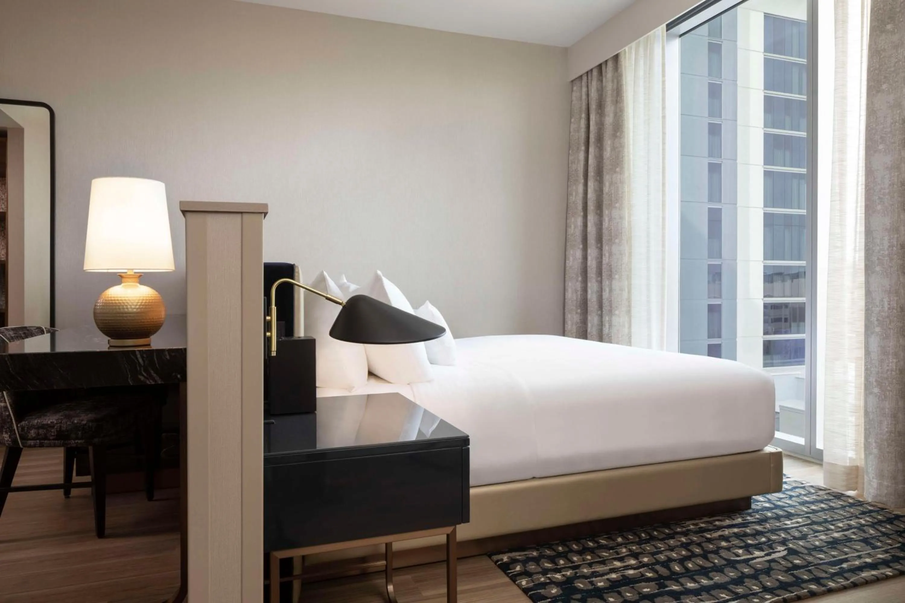 Bed in Caesars Republic Scottsdale, a Hilton Hotel