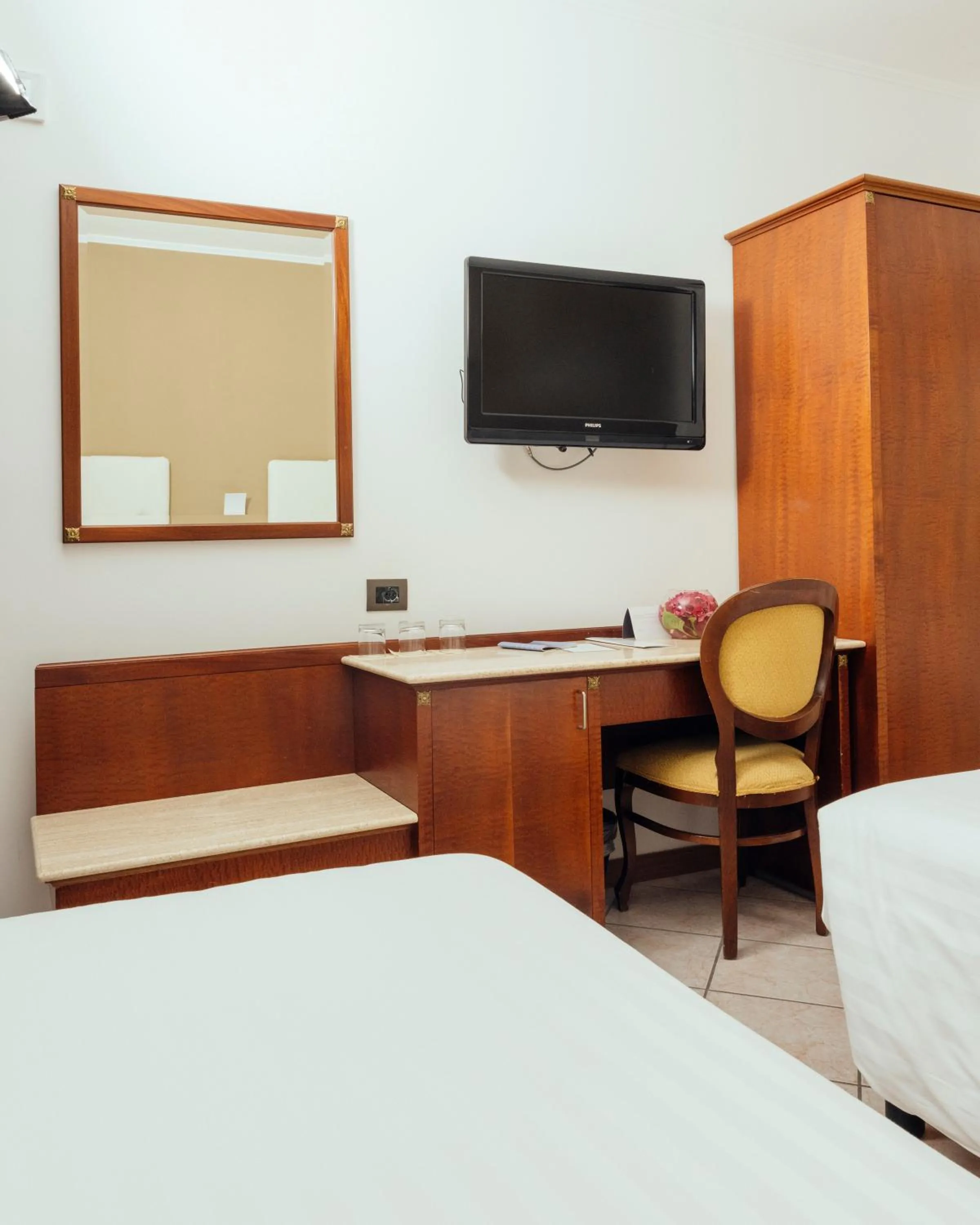 Communal lounge/ TV room, Bed in Grand Hotel Telese