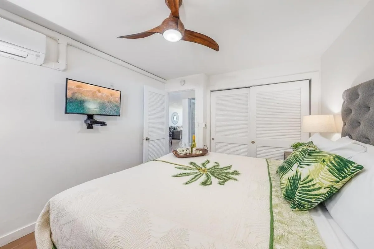 Bed in Lauloa 105 · LOA 105 2BD OceanFront Getaway w AC Pool