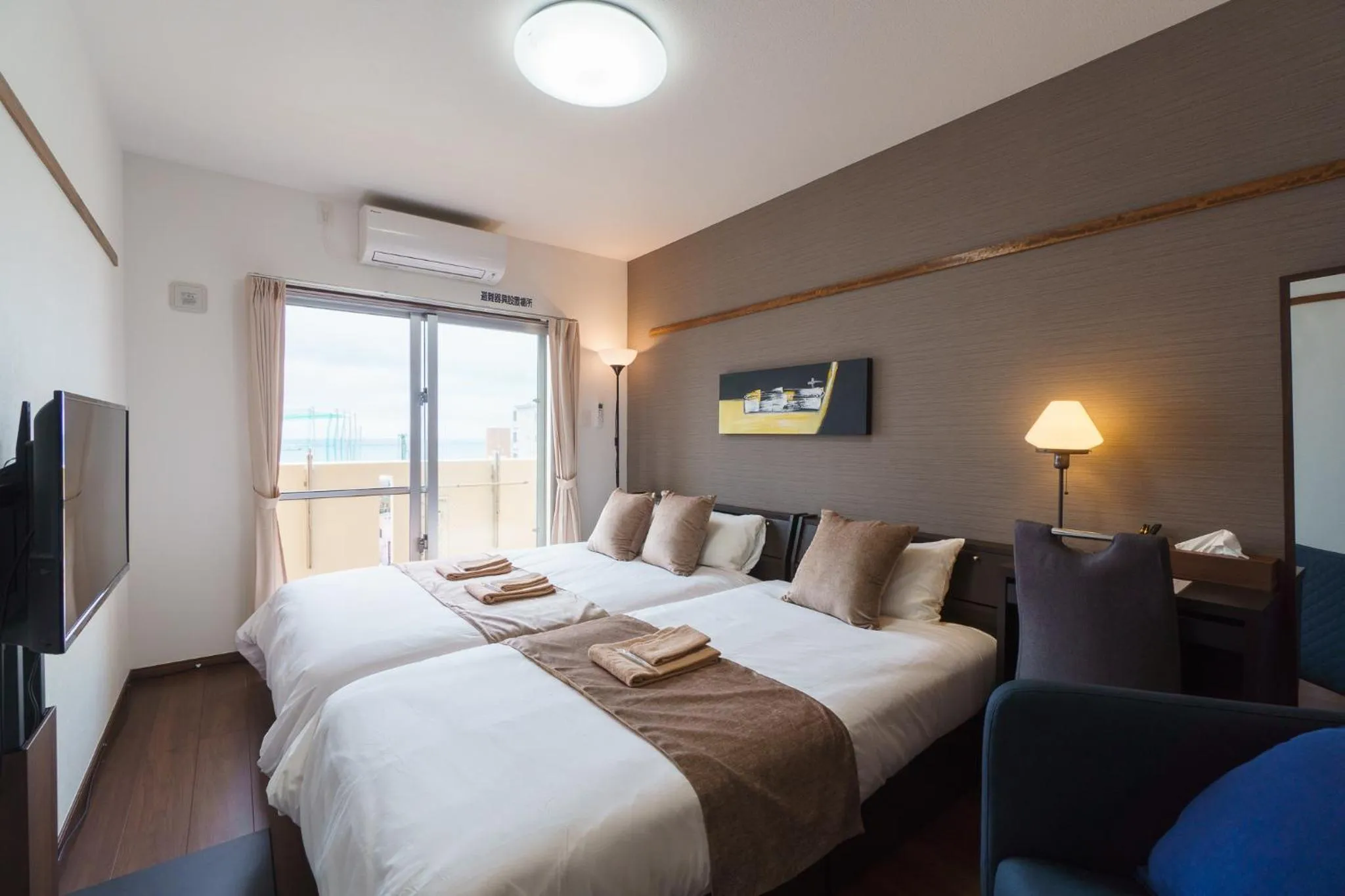 Bed in KINTARO Hotel Okinawa Naha