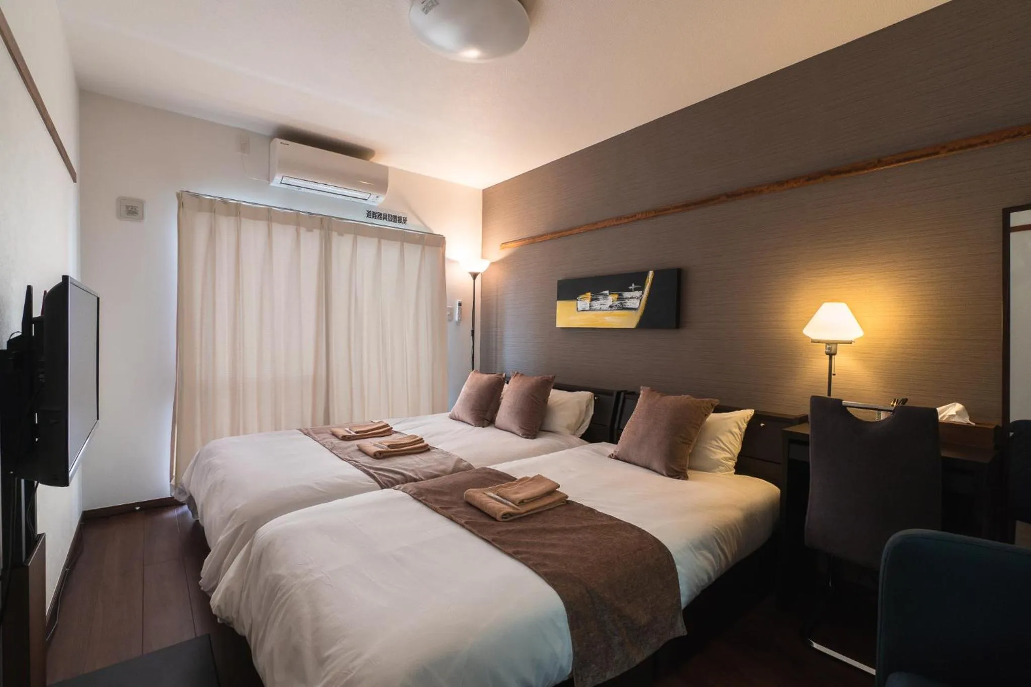 Bed in KINTARO Hotel Okinawa Naha