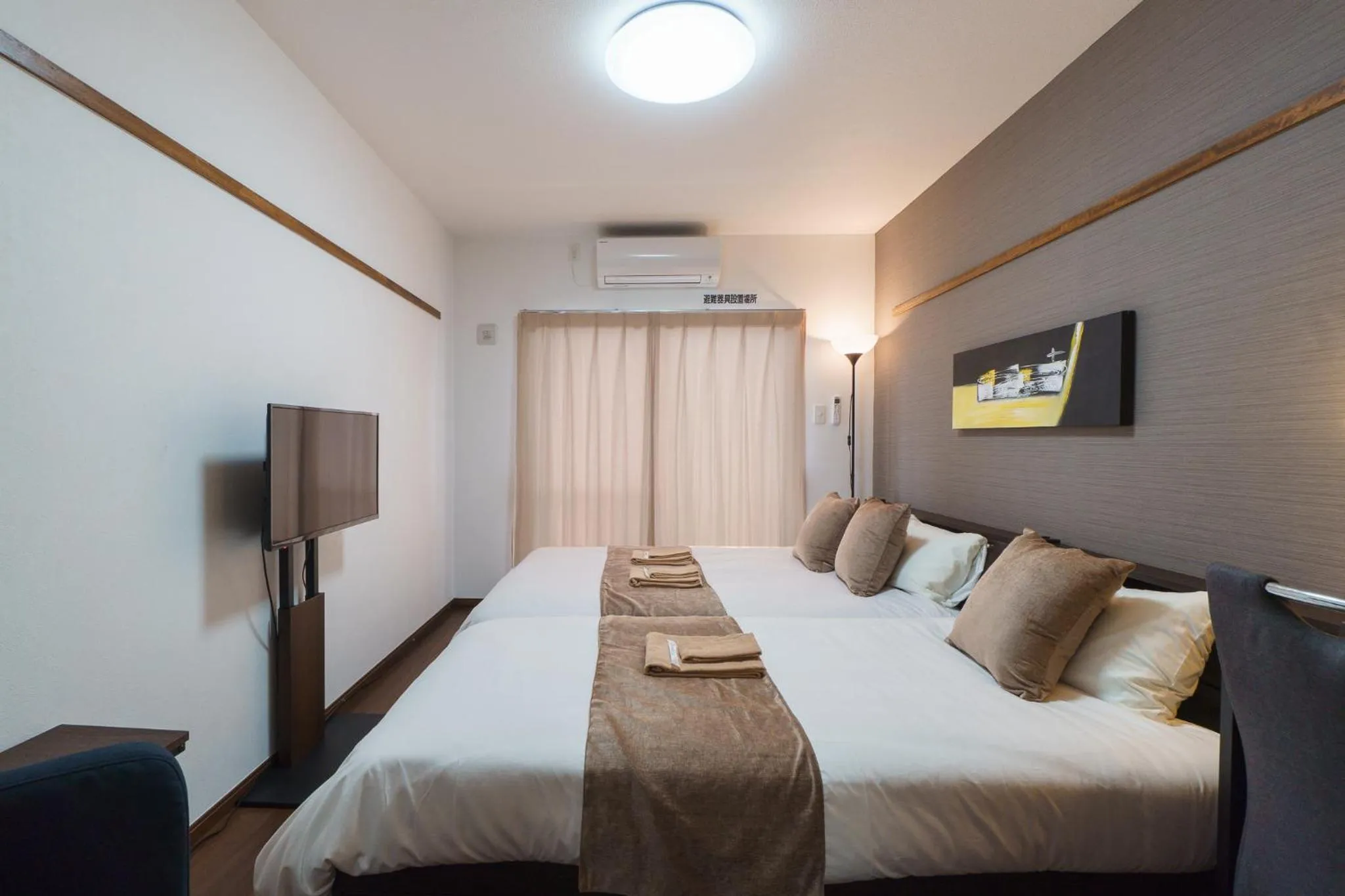 Bed in KINTARO Hotel Okinawa Naha