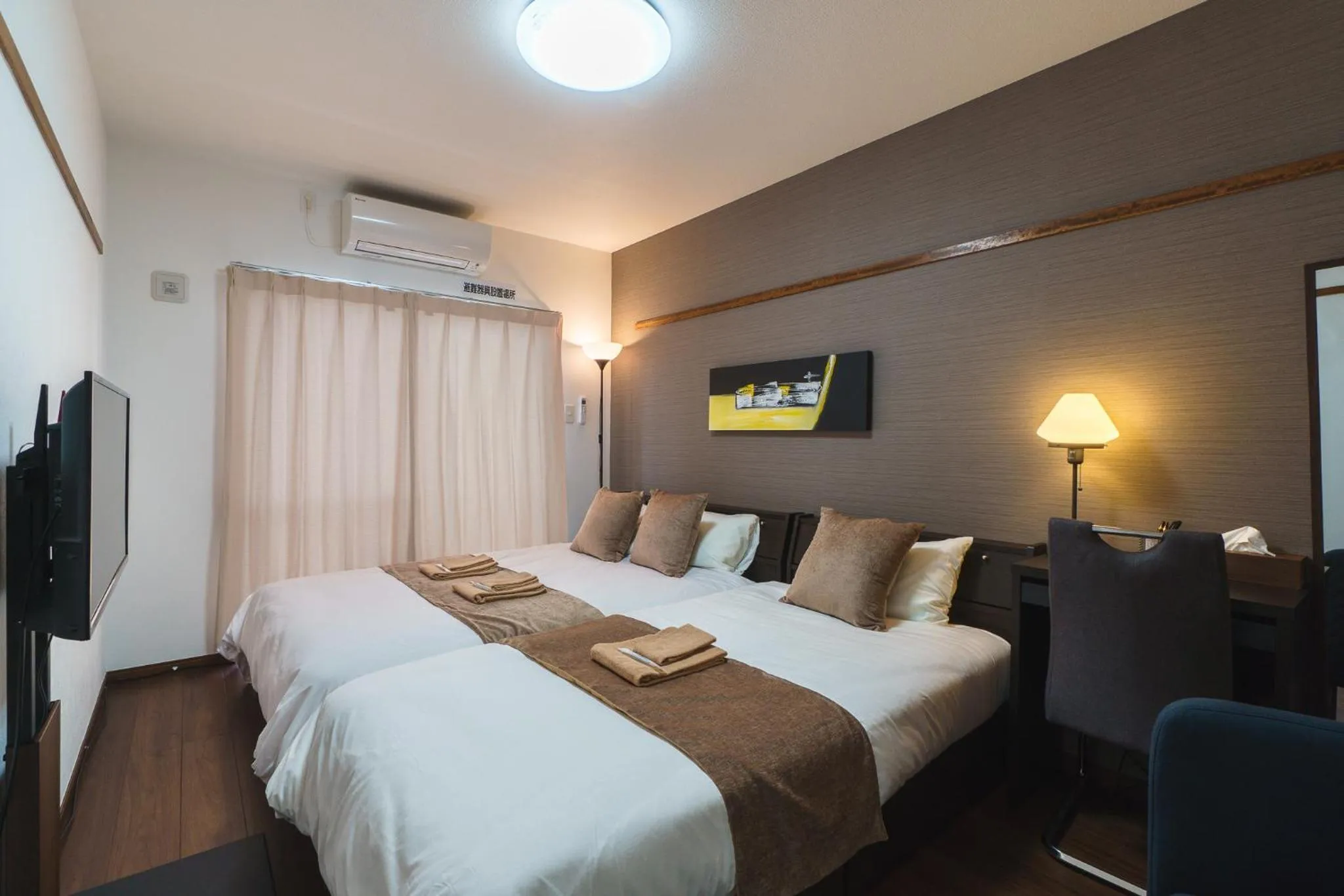 Bed in KINTARO Hotel Okinawa Naha