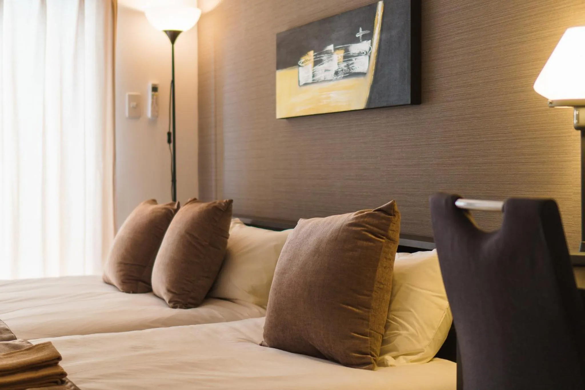 Bed in KINTARO Hotel Okinawa Naha